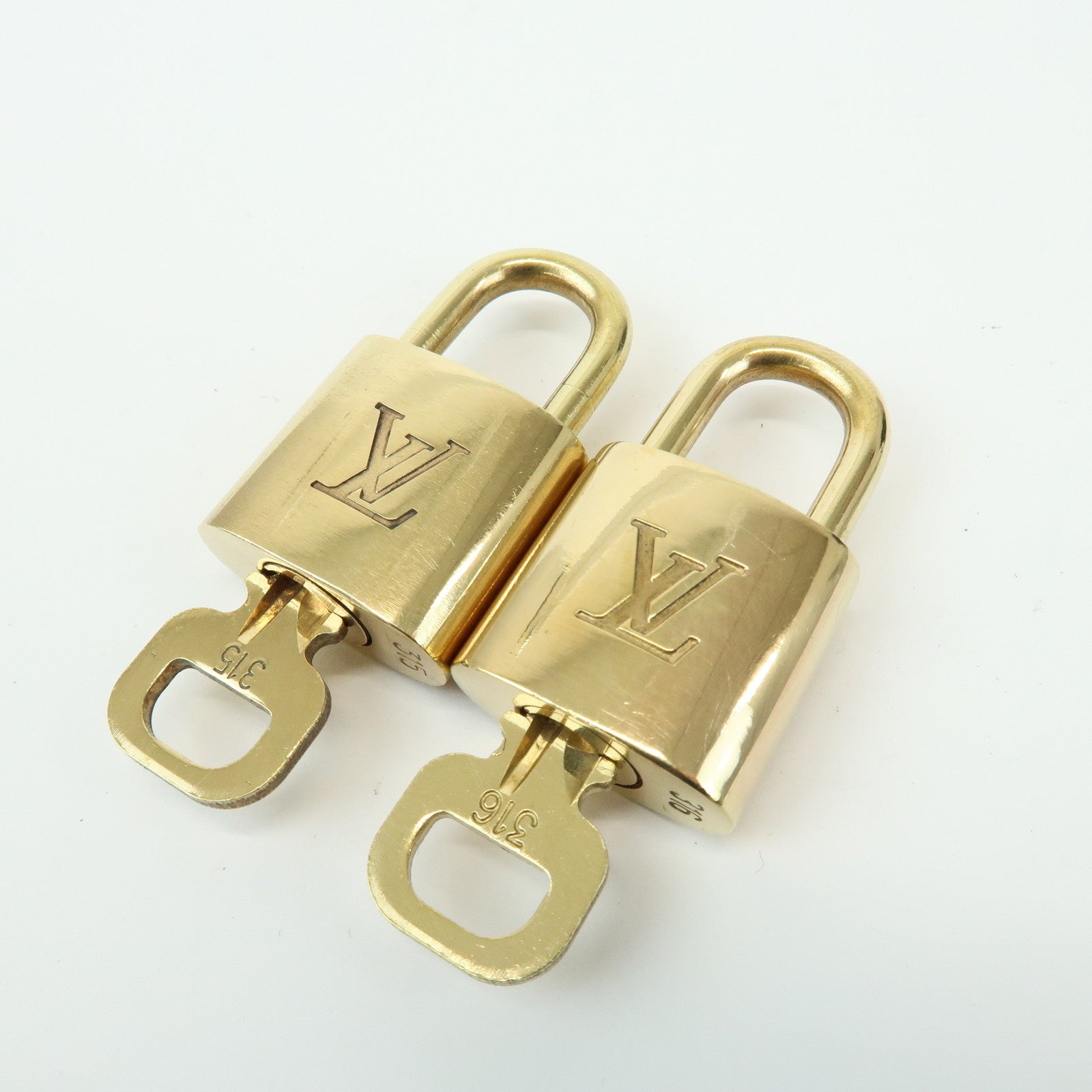 Louis Vuitton Set of 10 Lock & Key Cadena Key Lock