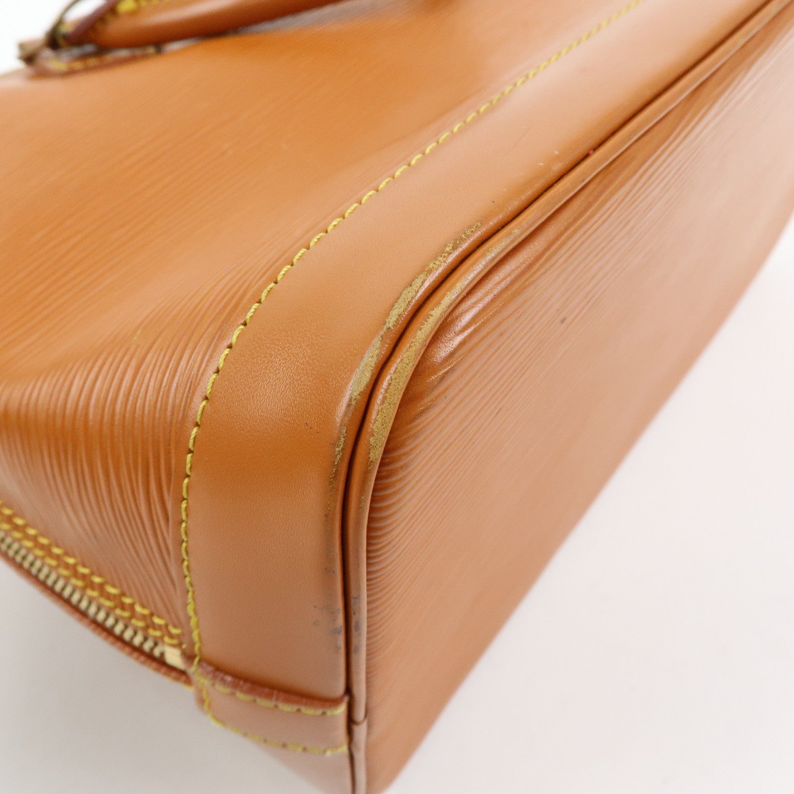 Louis Vuitton Epi Alma PM Leather Hand Bag Zipang Gold M52148