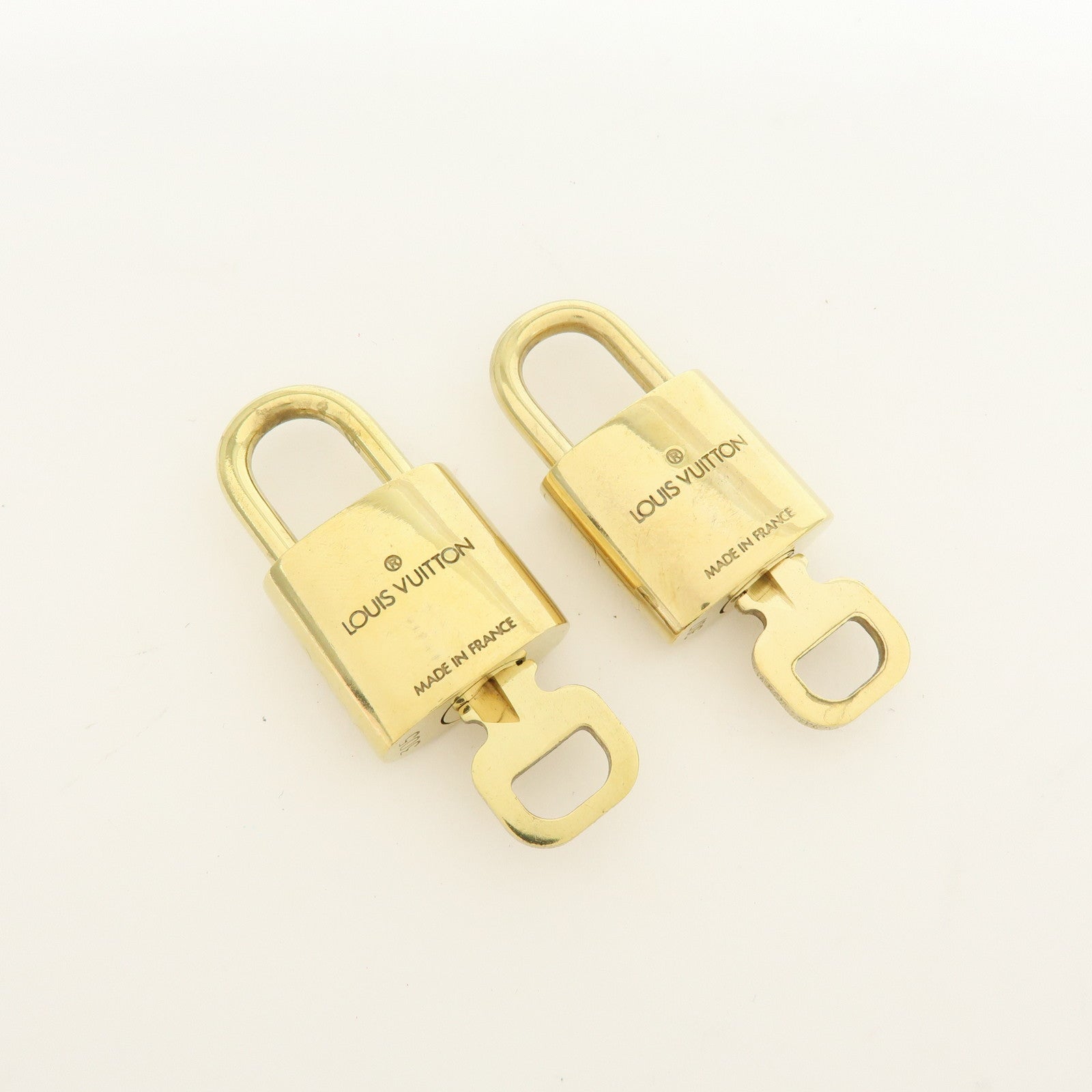 Louis Vuitton Lot of 10 Metal Lock & Key Cadena Key Lock Gold
