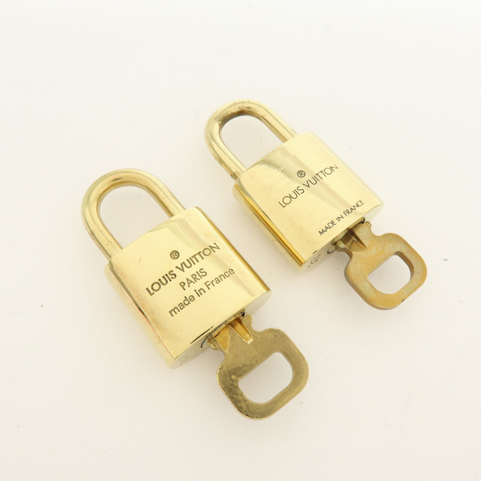 Louis Vuitton Lot of 10 Metal Lock & Key Cadena Key Lock Gold