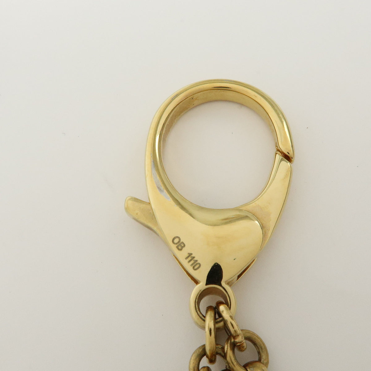 Louis Vuitton Bijou Sac Insolence Bag Charm Gold Brown M65844