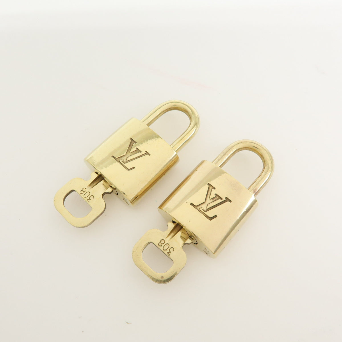 Louis Vuitton Lot of 10 Lock & Key Cadena Key Lock Gold