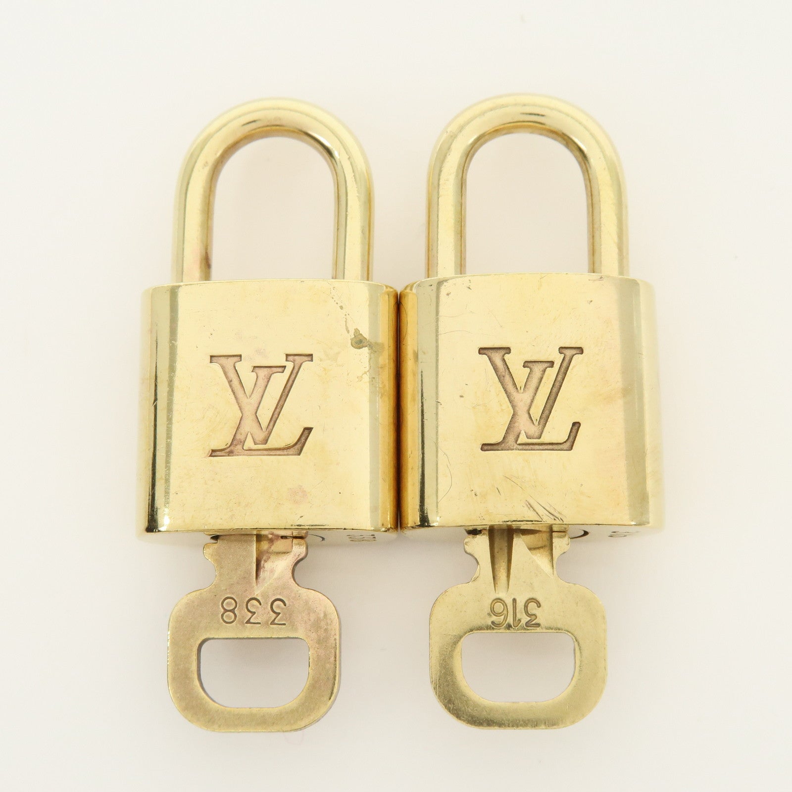 Louis Vuitton Lot of 10 Lock & Key Cadena Key Lock Gold