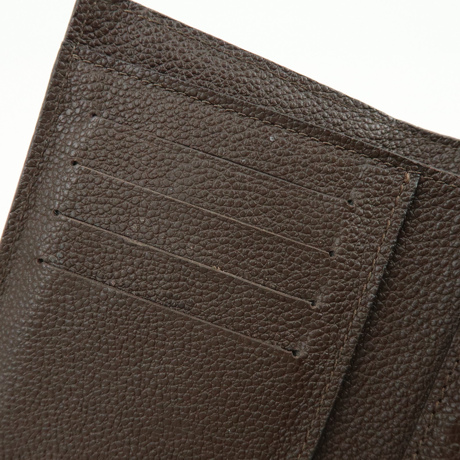 Louis Vuitton Empreinte Portefeuille Curieuse Compact Wallet M60543