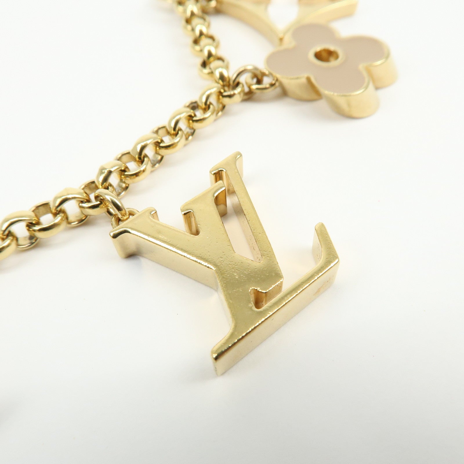 Louis Vuitton Fleur de Monogram Metal Bag Charm Key Chain Gold M65111