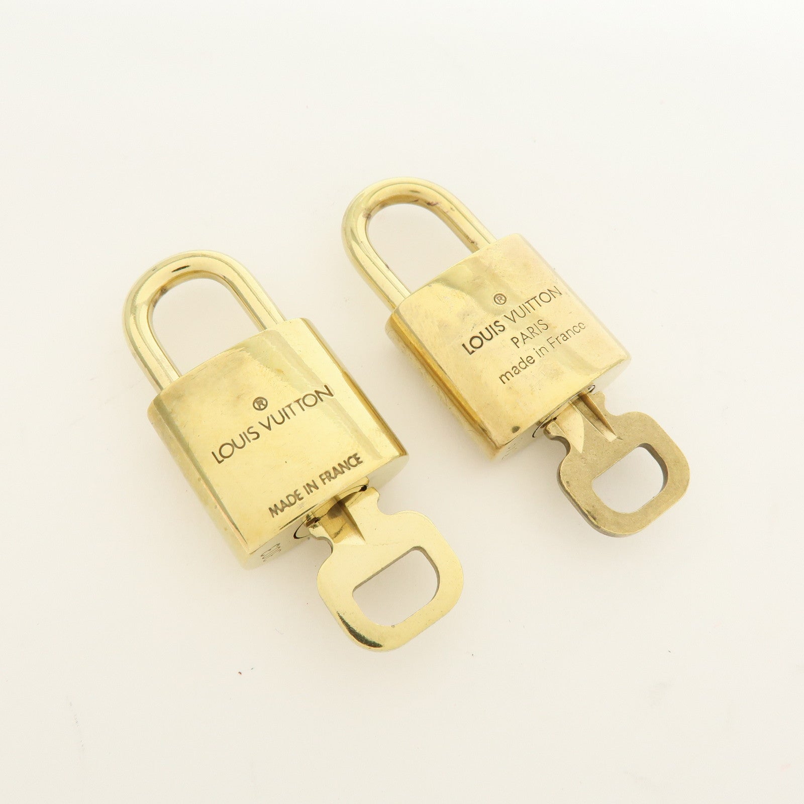 Louis Vuitton Lot of 10 Metal Lock & Key Cadena Key Lock Gold