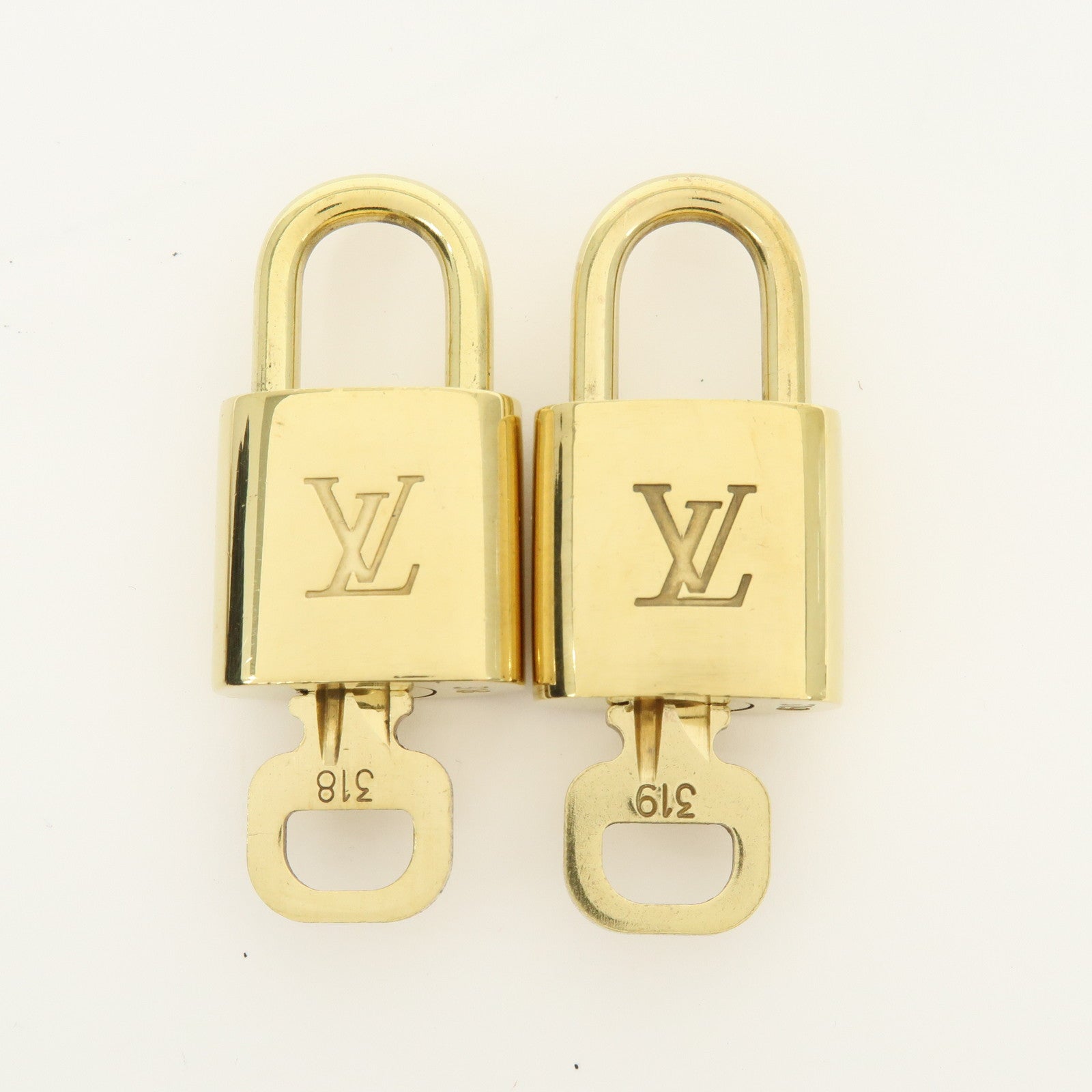 Louis Vuitton Lot of 10 Lock & Key Cadena Key Lock Gold
