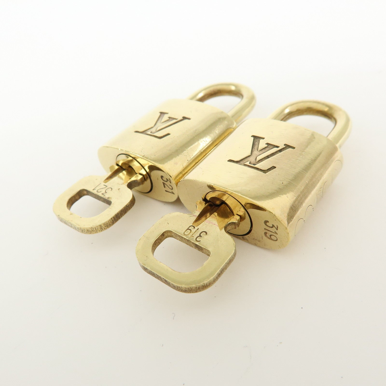 Louis Vuitton Set of 10 Lock & Key Cadena Key Lock Gold