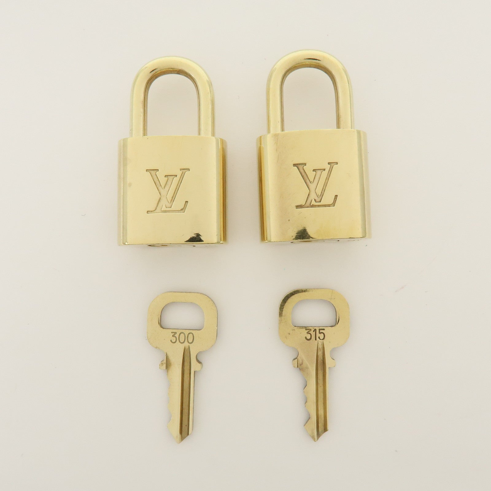 Louis Vuitton Set of 10 Metal Lock & Key Cadena Key Lock Gold