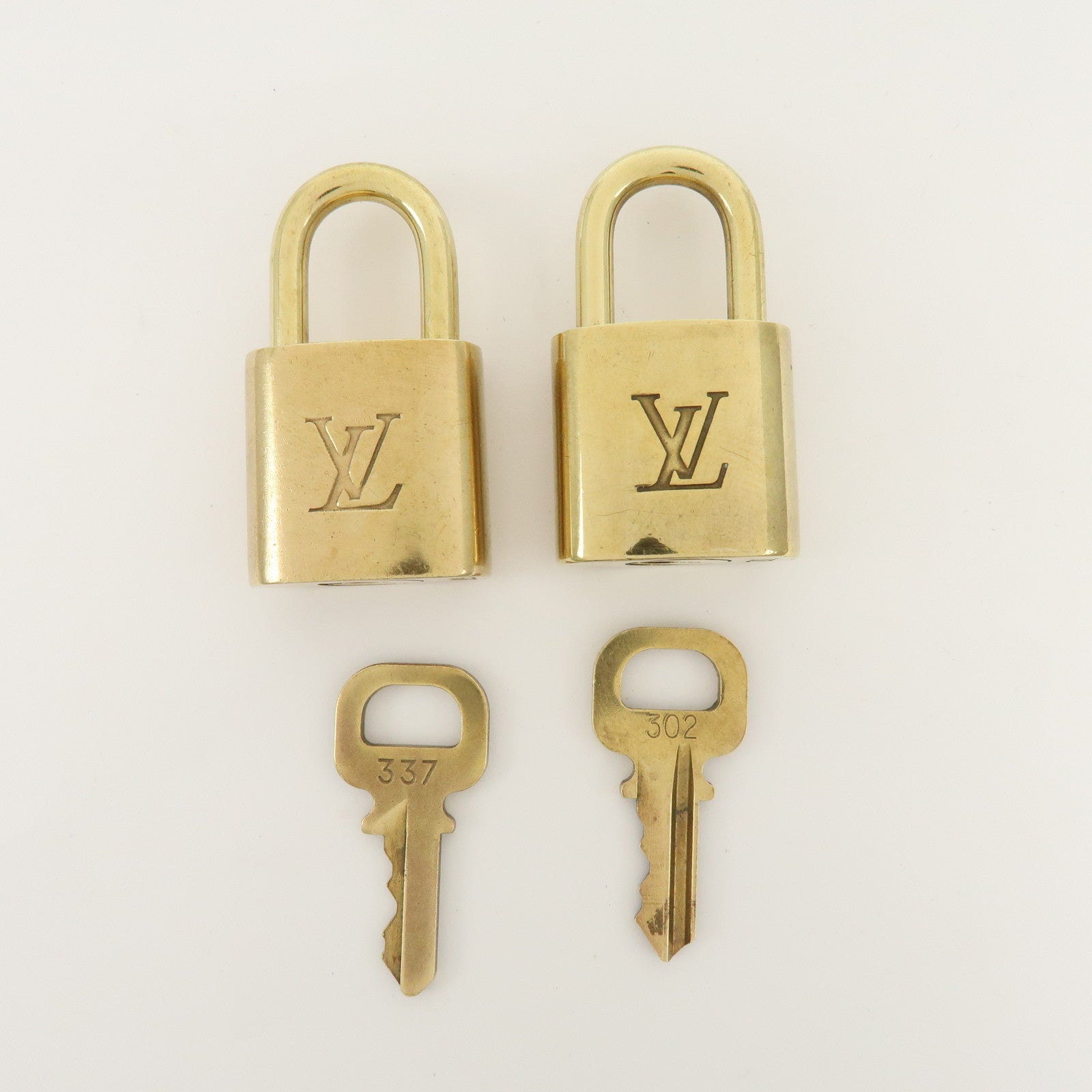 Louis Vuitton Set of 10 Metal Lock & Key Cadena Key Lock Gold