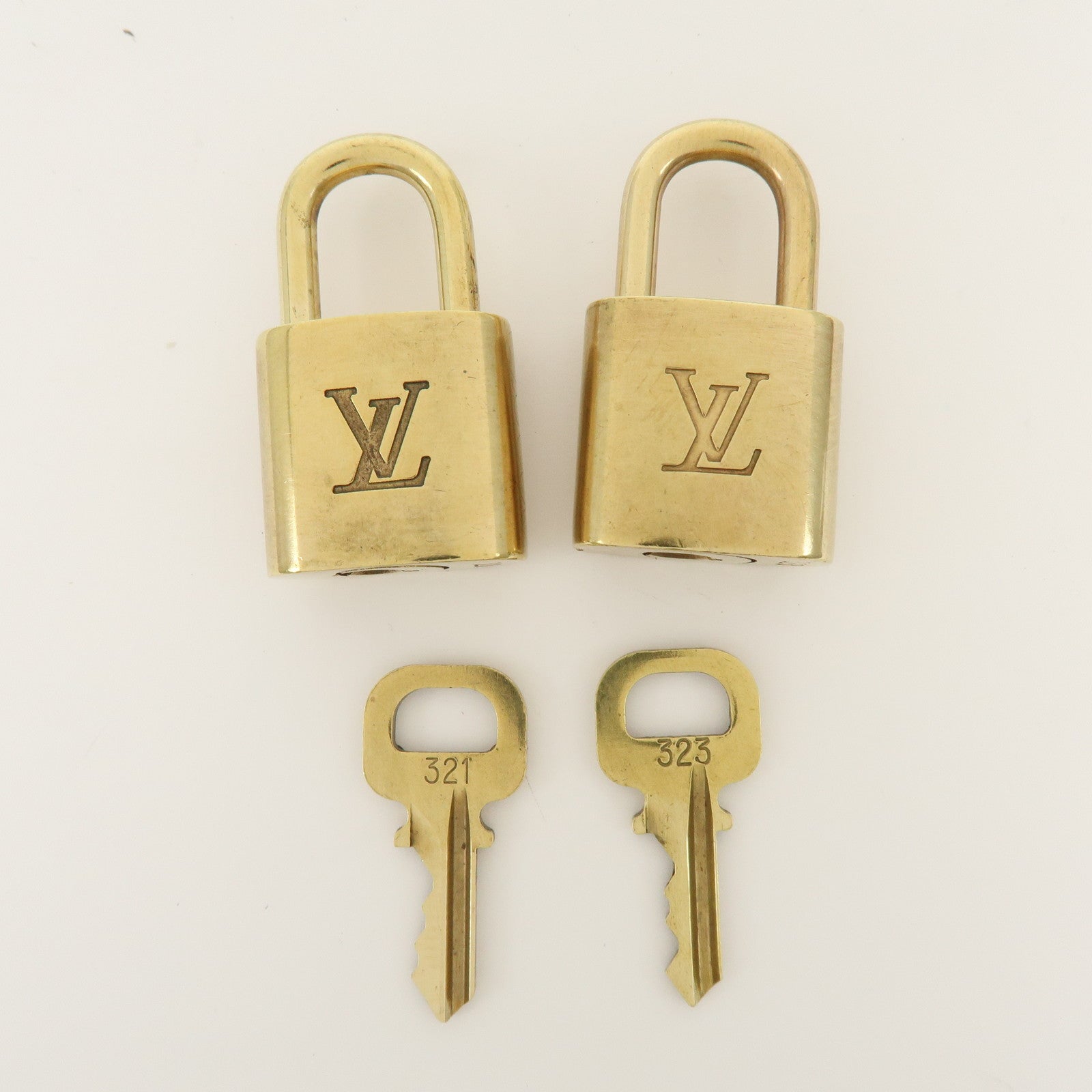 Louis Vuitton Set of 10 Metal Lock & Key Cadena Key Lock Gold