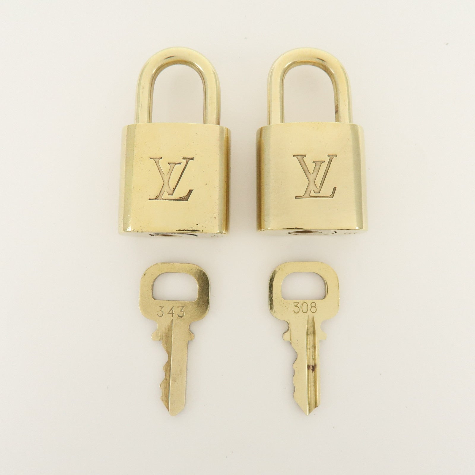 Louis Vuitton Set of 10 Metal Lock & Key Cadena Key Lock Gold