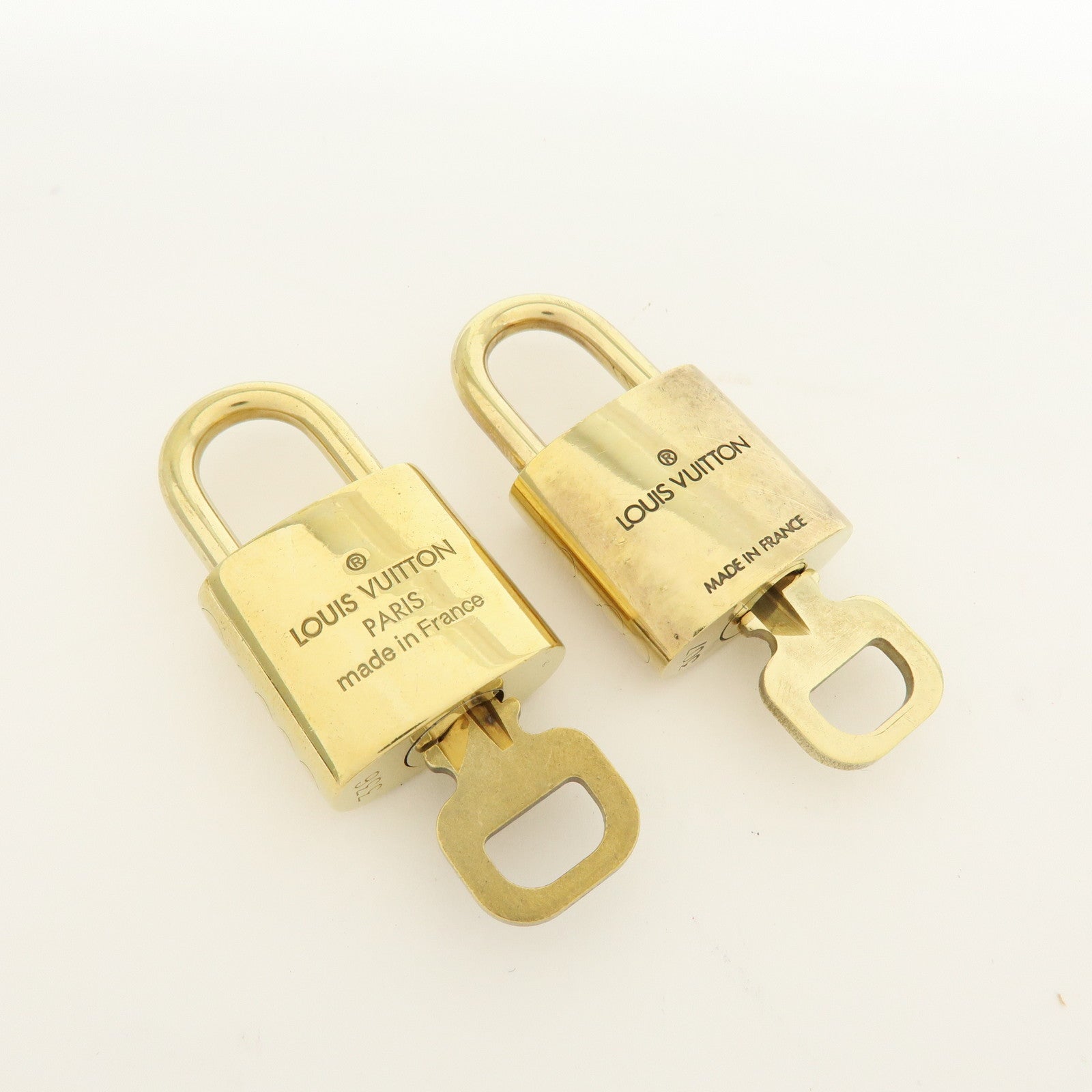 Louis Vuitton Lot of 10 Metal Lock & Key Cadena Key Lock Gold
