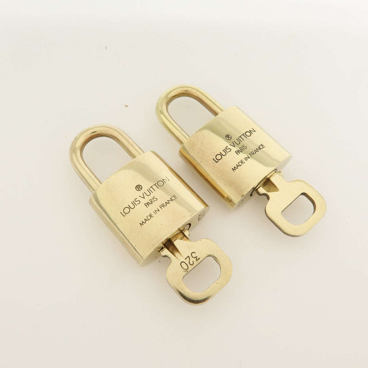 Louis Vuitton Lot of 10 Lock & Key Cadena Key Lock Gold