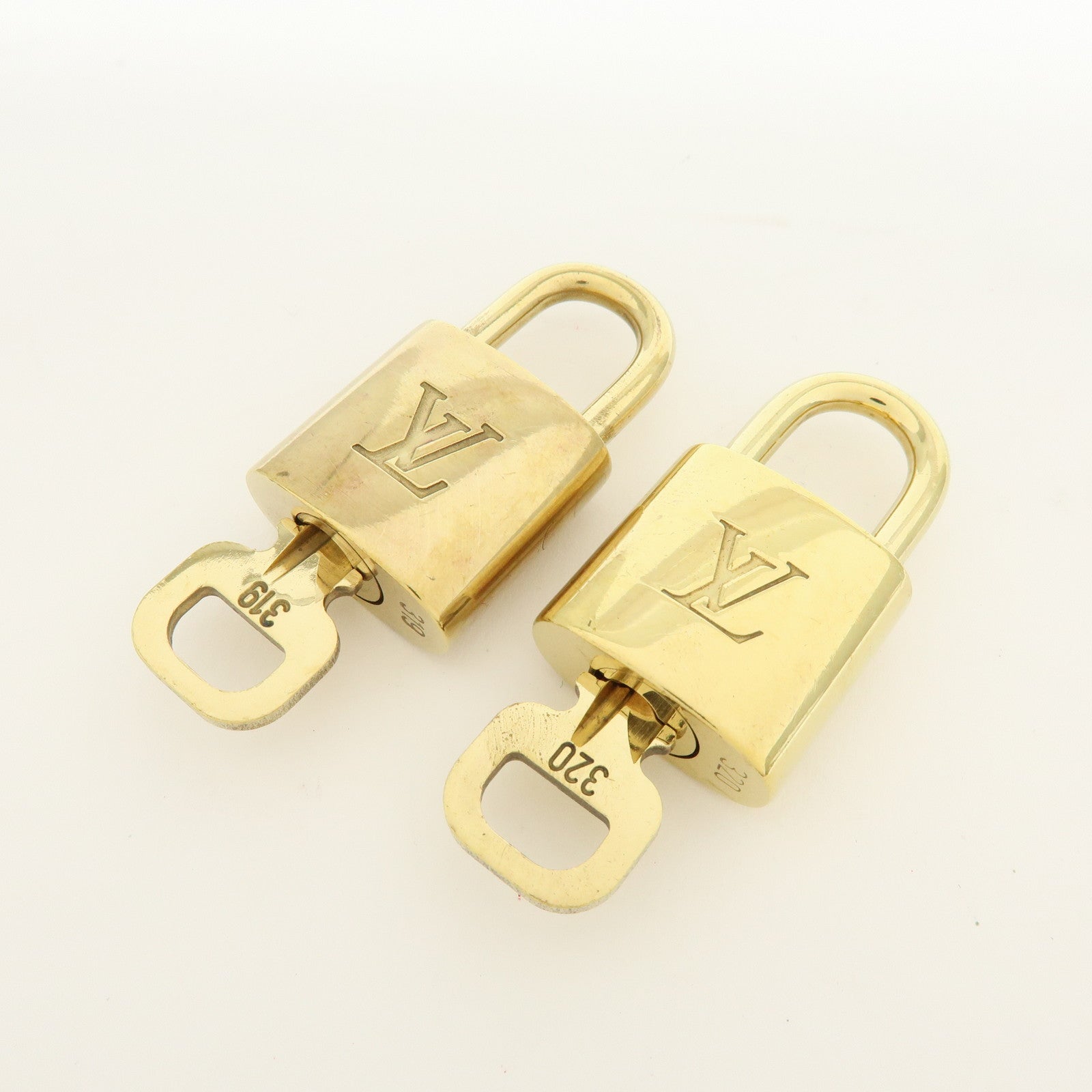 Louis Vuitton Lot of 10 Metal Lock & Key Cadena Key Lock Gold