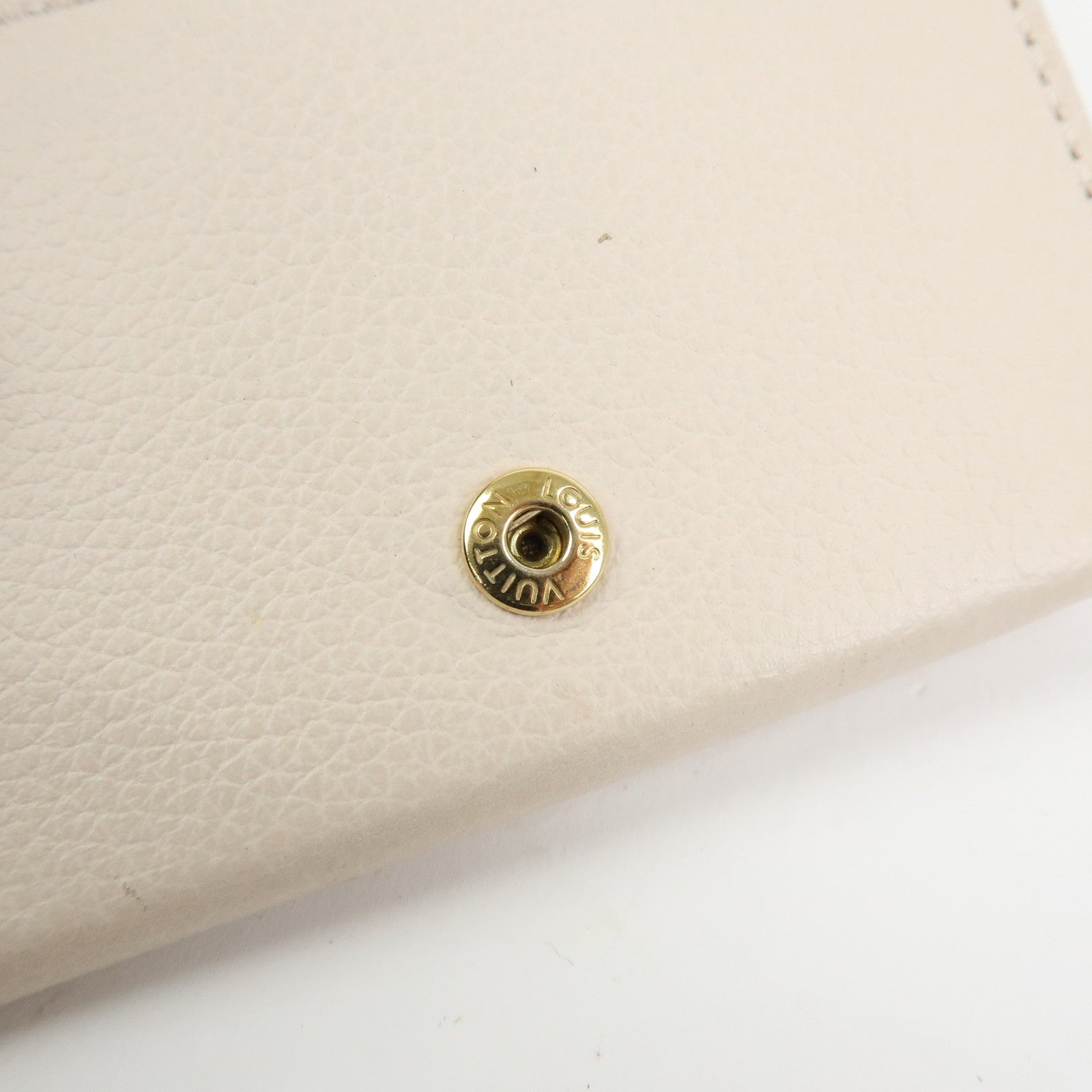 Louis Vuitton Portefeuille Lockmini Taurillon Compact Wallet M80785