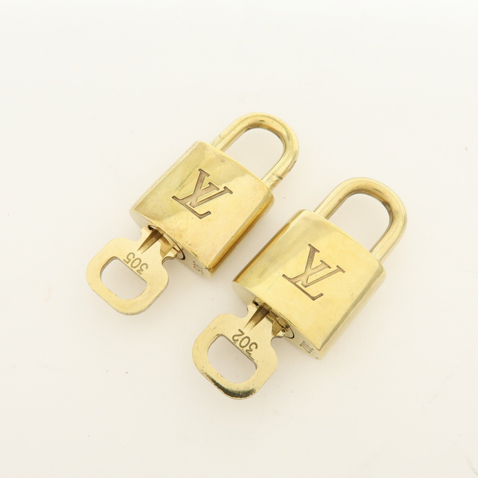 Louis Vuitton Lot of 10 Metal Lock & Key Cadena Key Lock Gold