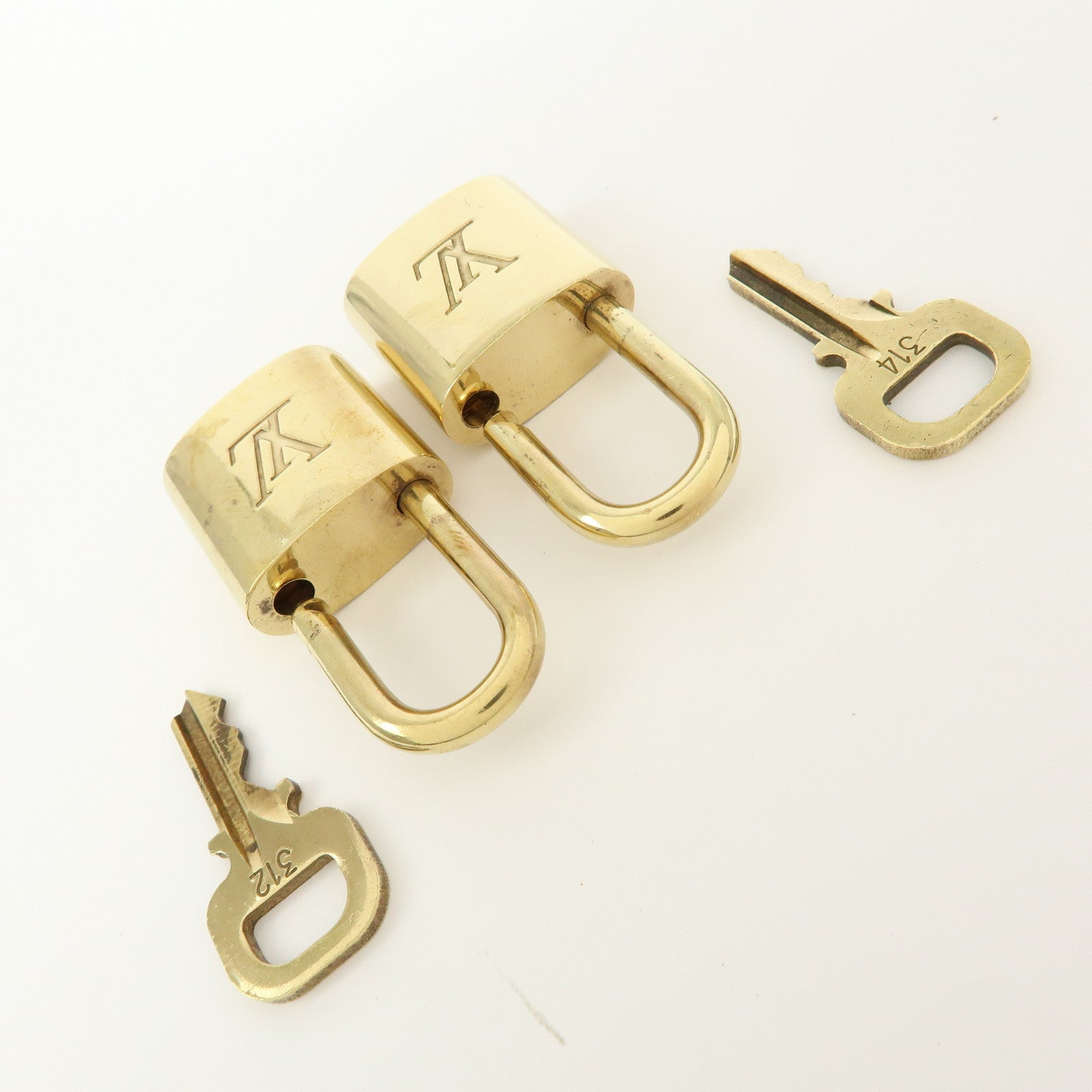 Louis Vuitton Set of 10 Lock & Key Cadena Key Lock Gold