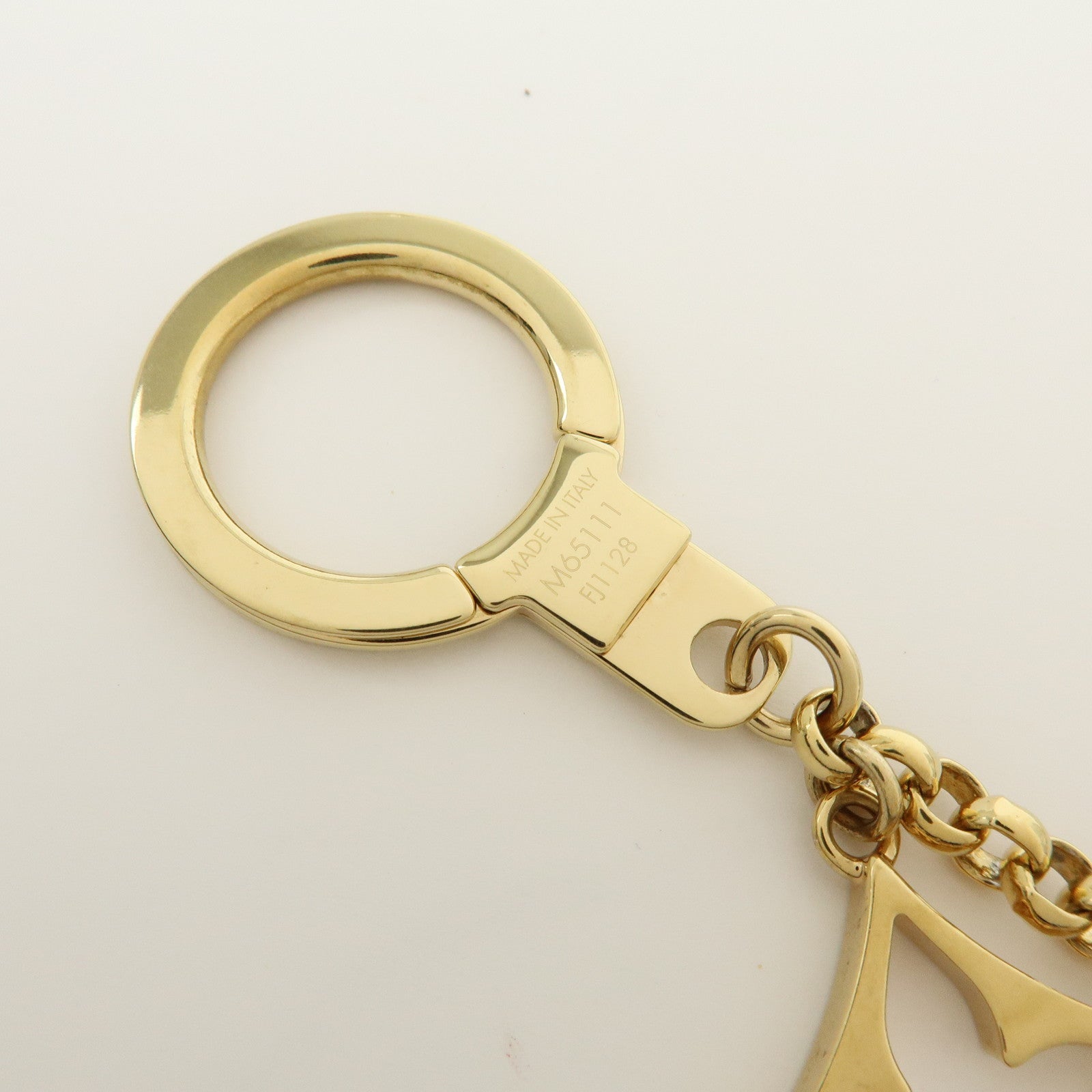 Louis Vuitton Fleur de Monogram Metal Bag Charm Key Chain Gold M65111