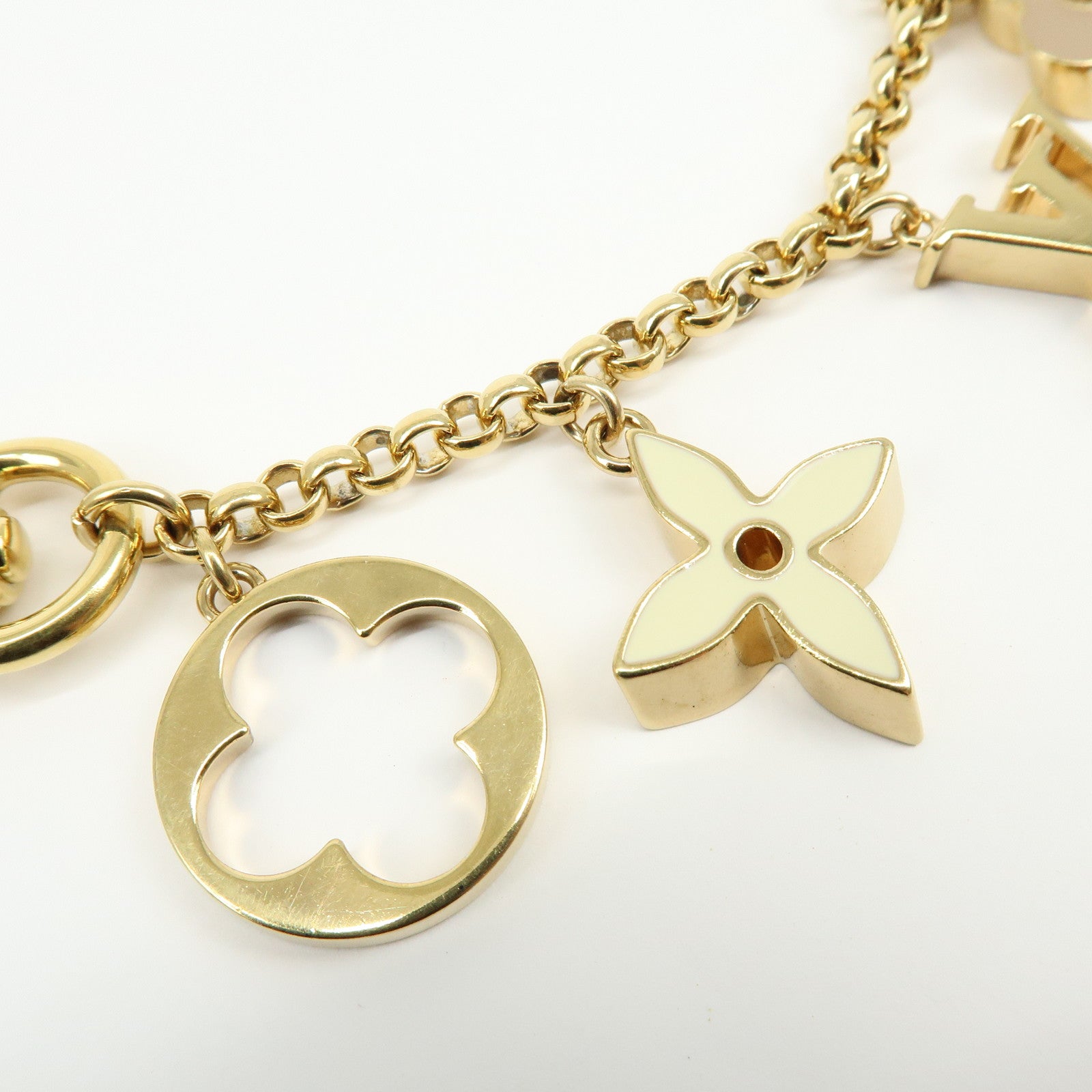Louis Vuitton Fleur de Monogram Metal Bag Charm Key Chain Gold M65111