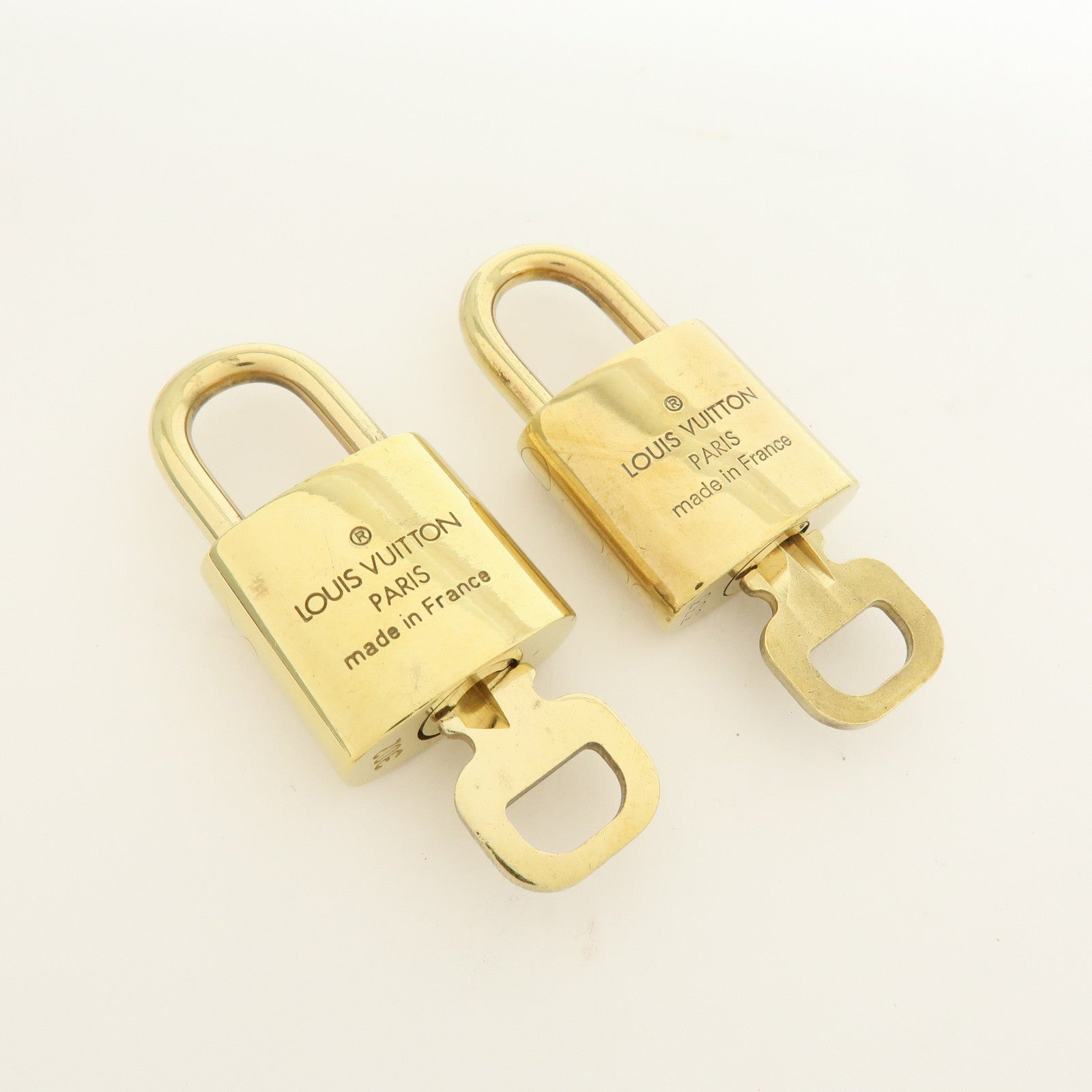 Louis Vuitton Lot of 10 Metal Lock & Key Cadena Key Lock Gold