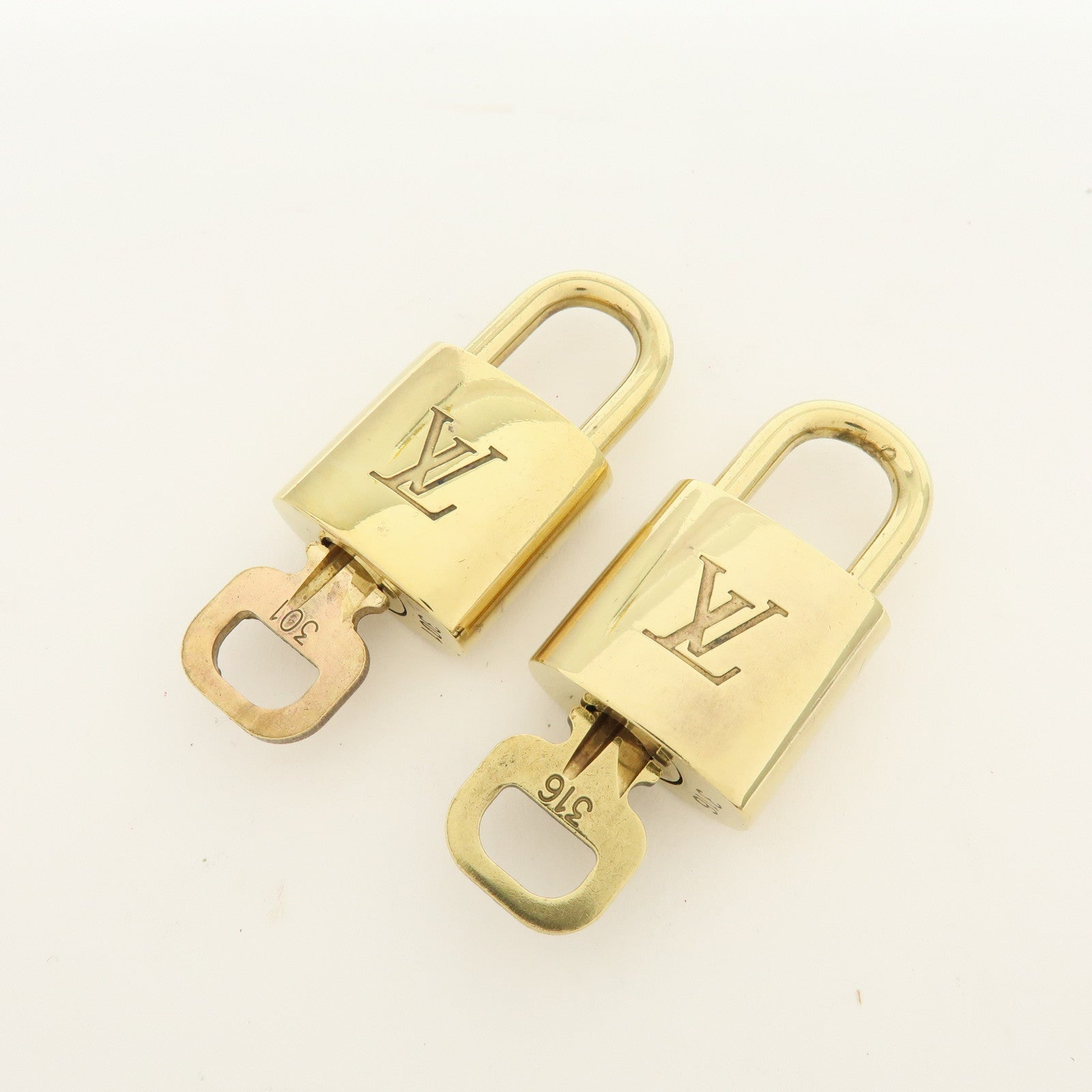Louis Vuitton Lot of 10 Metal Lock & Key Cadena Key Lock Gold