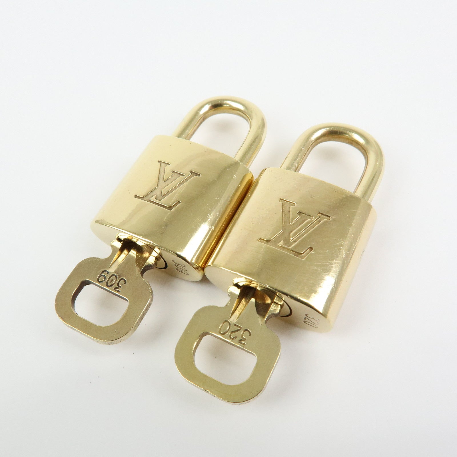 Louis Vuitton Set of 10 Lock & Key Cadena Key Lock Gold