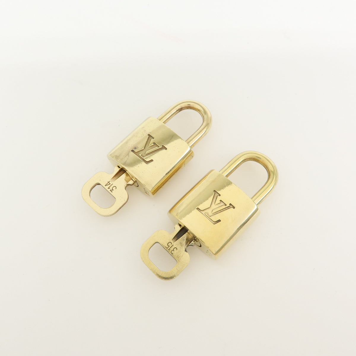 Louis Vuitton Lot of 10 Lock & Key Cadena Key Lock Gold