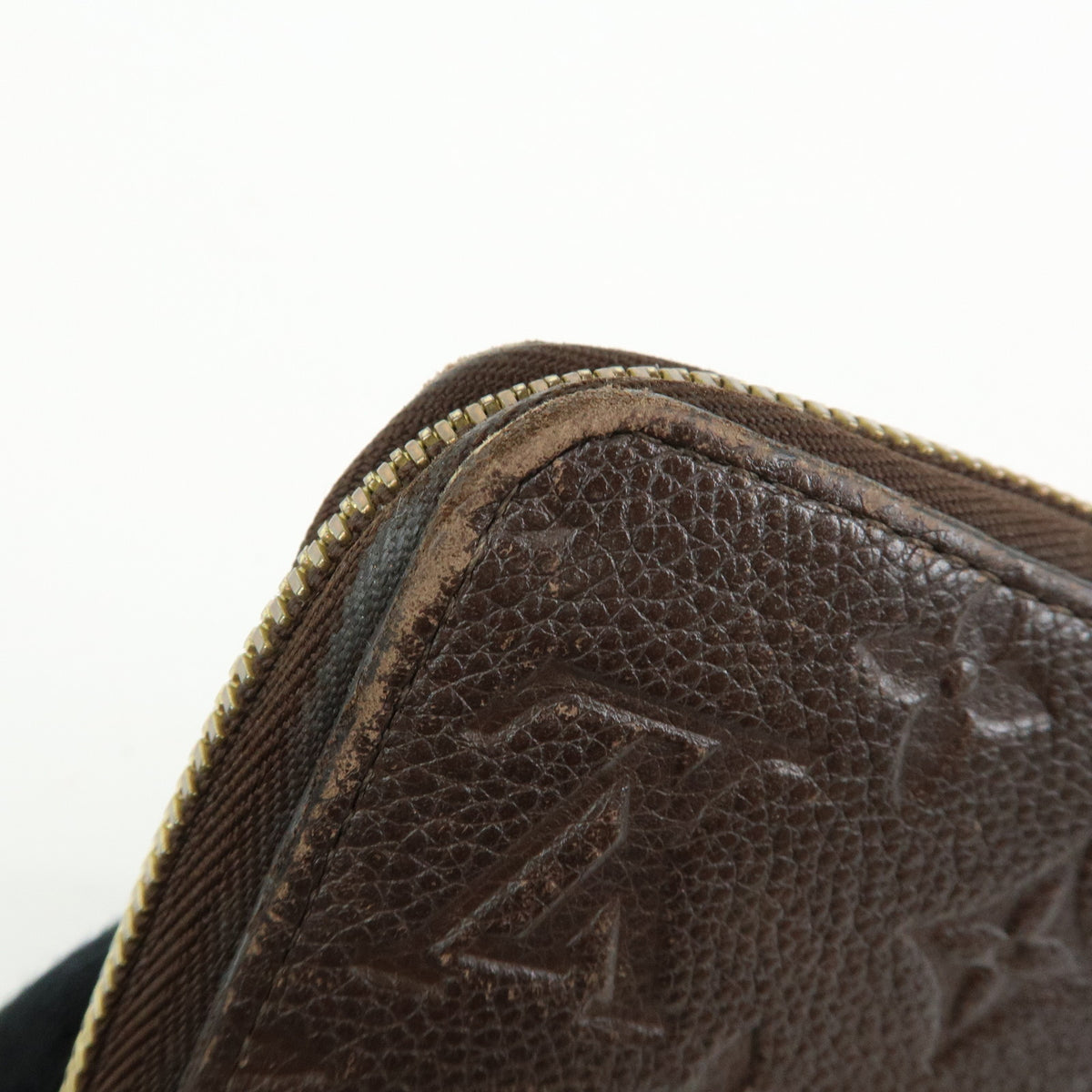 Louis Vuitton Monogram Empreinte Round Zippy Wallet Terre M60548