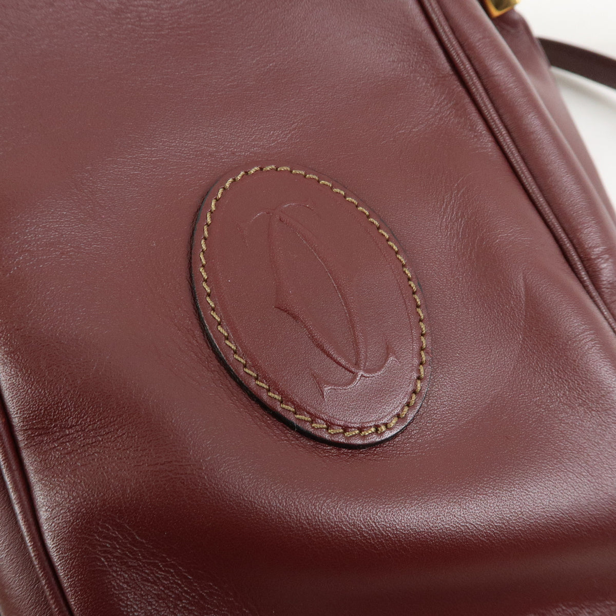 Cartier Must de Cartier Leather Drawstring Mini Shoulder Bag Bordeaux