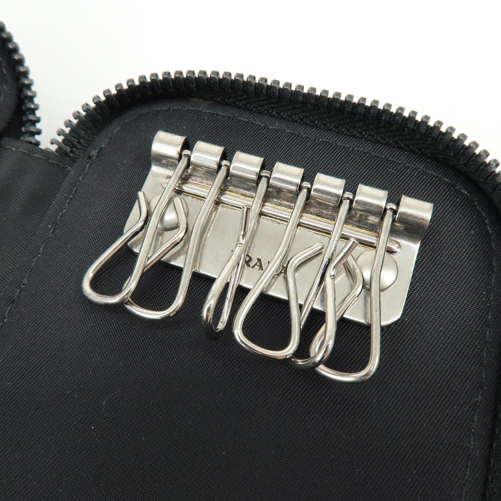 PRADA Triangle Logo Nylon Saffiano Leather Zippy Key Case Black 2PG003