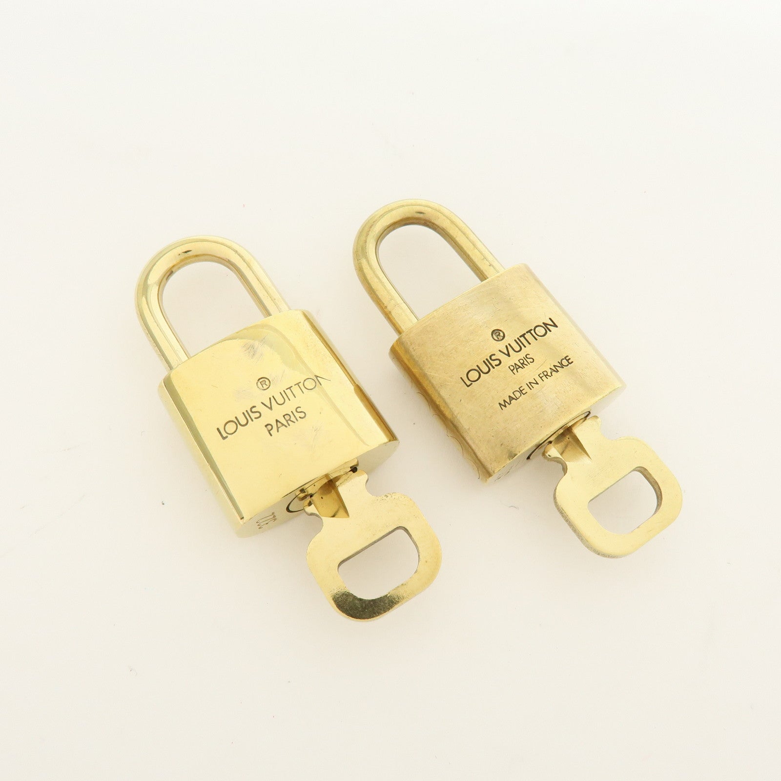Louis Vuitton Lot of 10 Metal Lock & Key Cadena Key Lock Gold