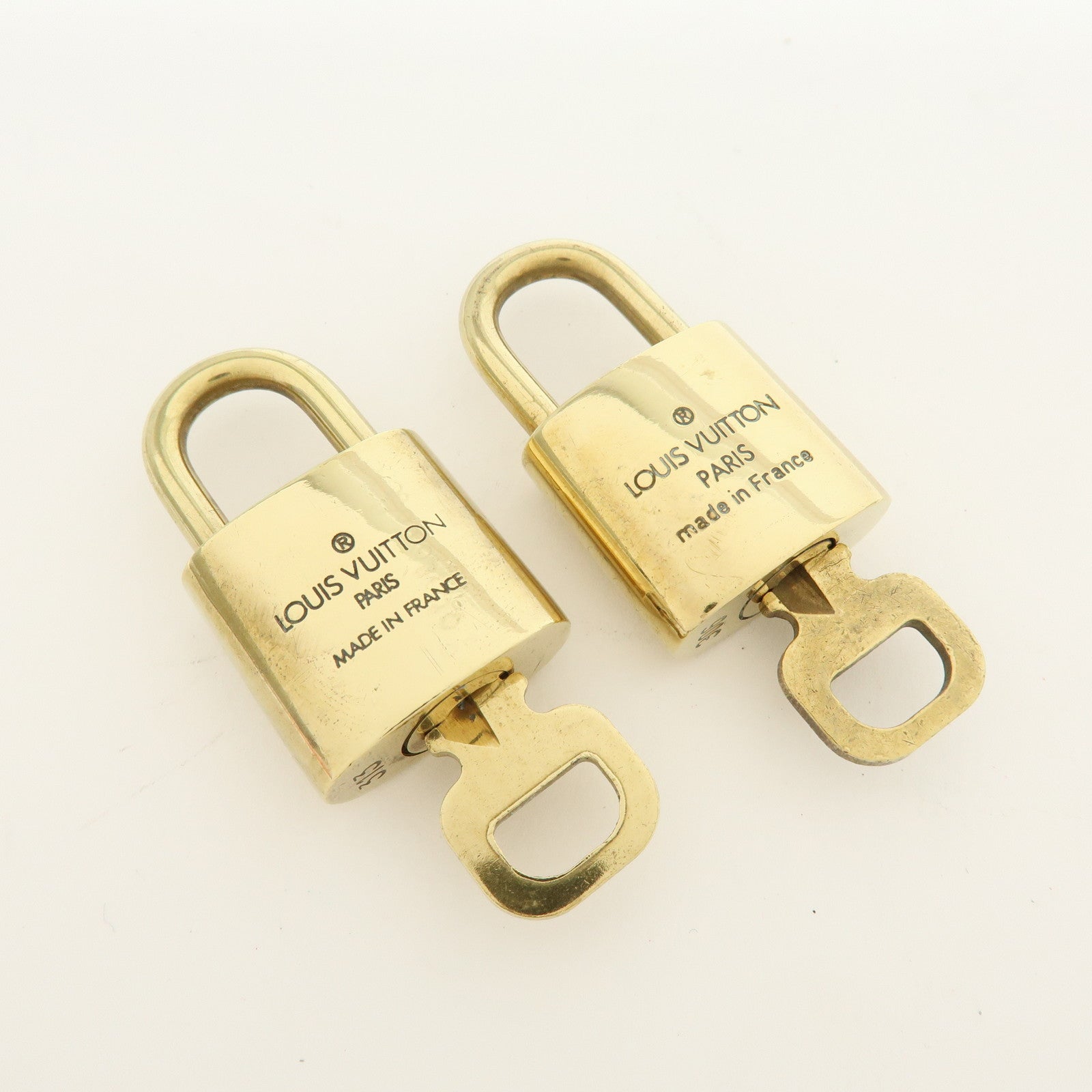 Louis Vuitton Lot of 10 Metal Lock & Key Cadena Key Lock Gold
