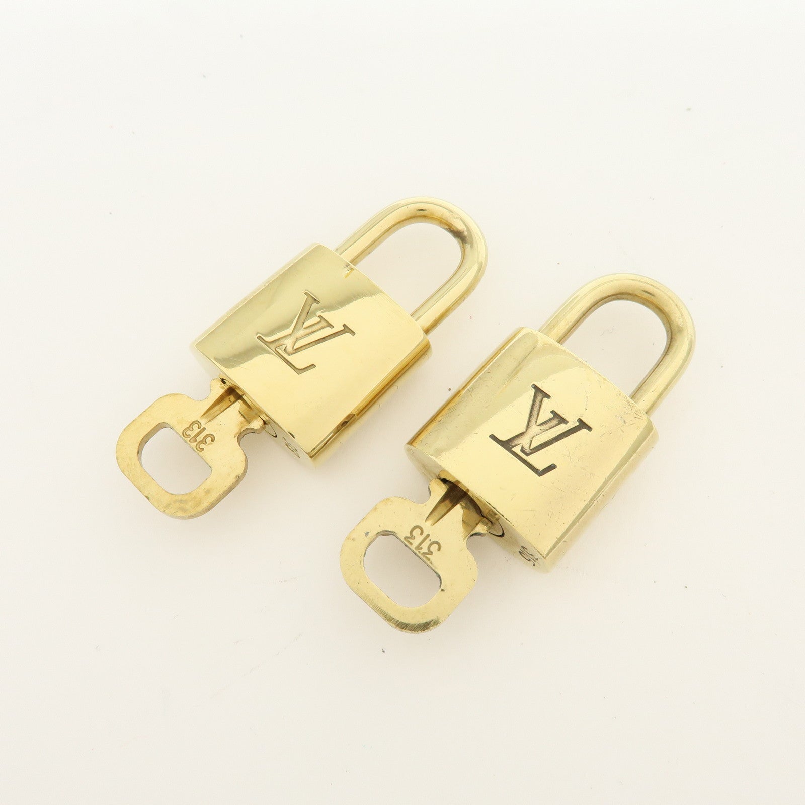 Louis Vuitton Lot of 10 Metal Lock & Key Cadena Key Lock Gold