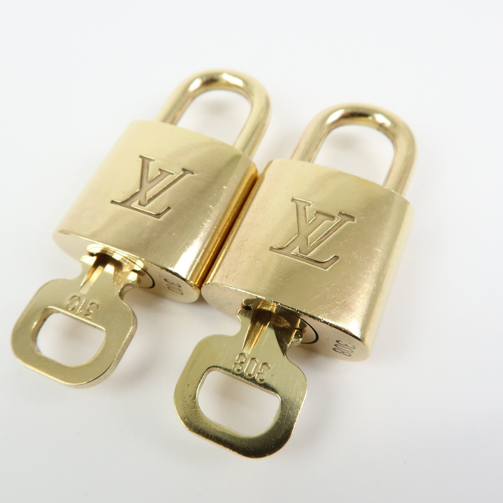 Louis Vuitton Set of 10 Lock & Key Cadena Key Lock Gold