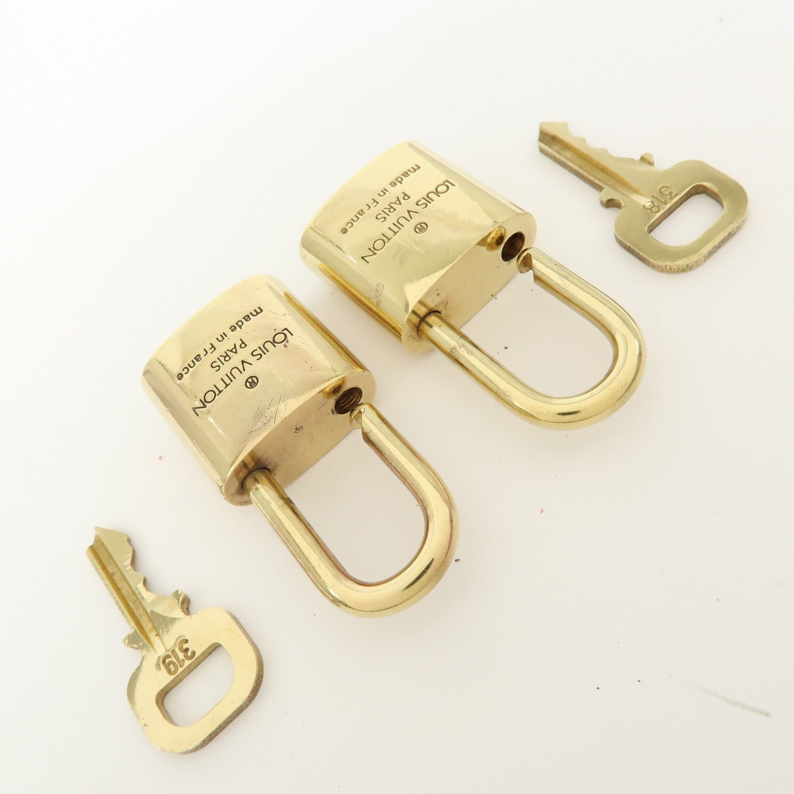 LOUIS VUITTON ゴールドヘアピンセット Louis Vuitton Set of 10 Lock & Key Cadena Key Lock Gold
