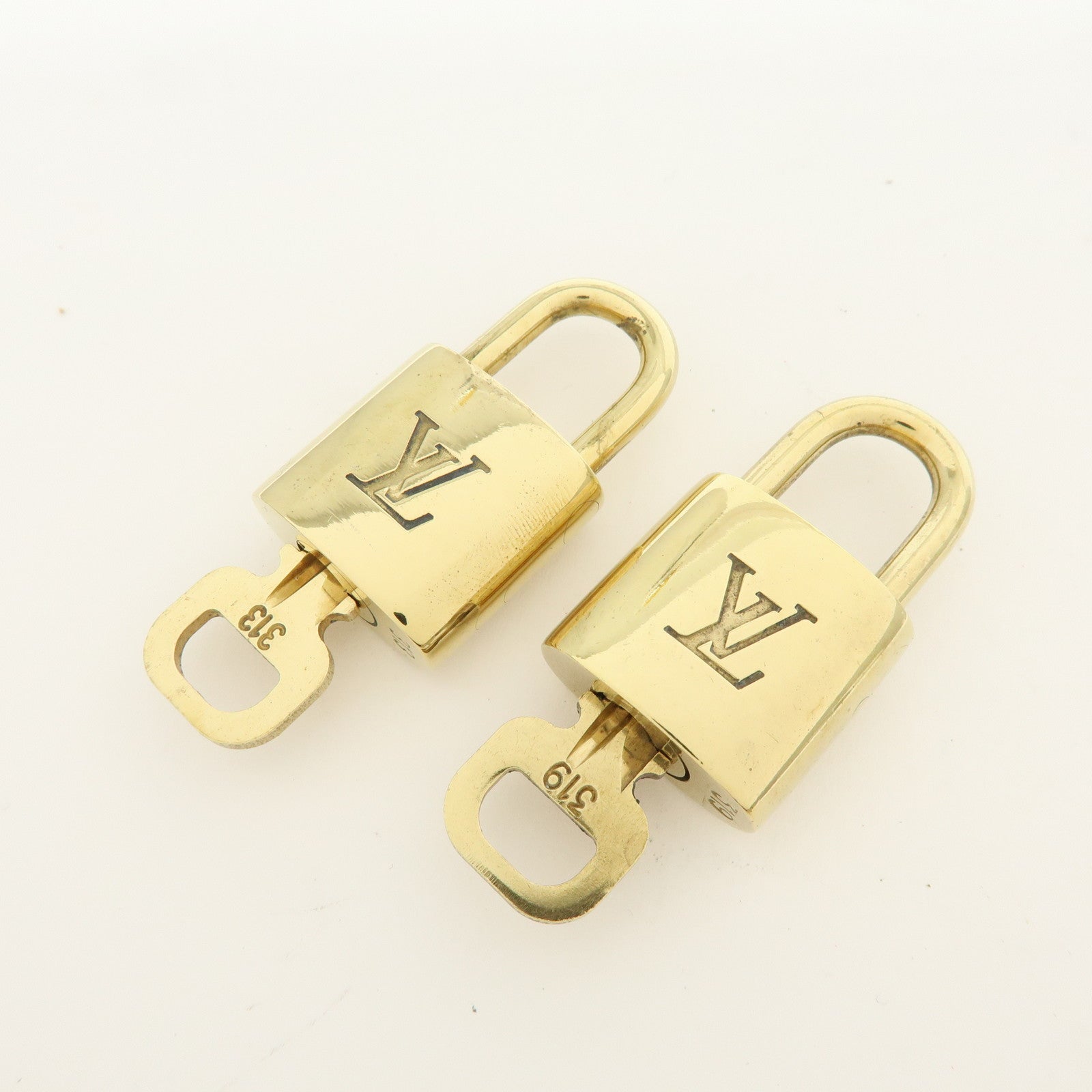 Louis Vuitton Lot of 10 Metal Lock & Key Cadena Key Lock Gold