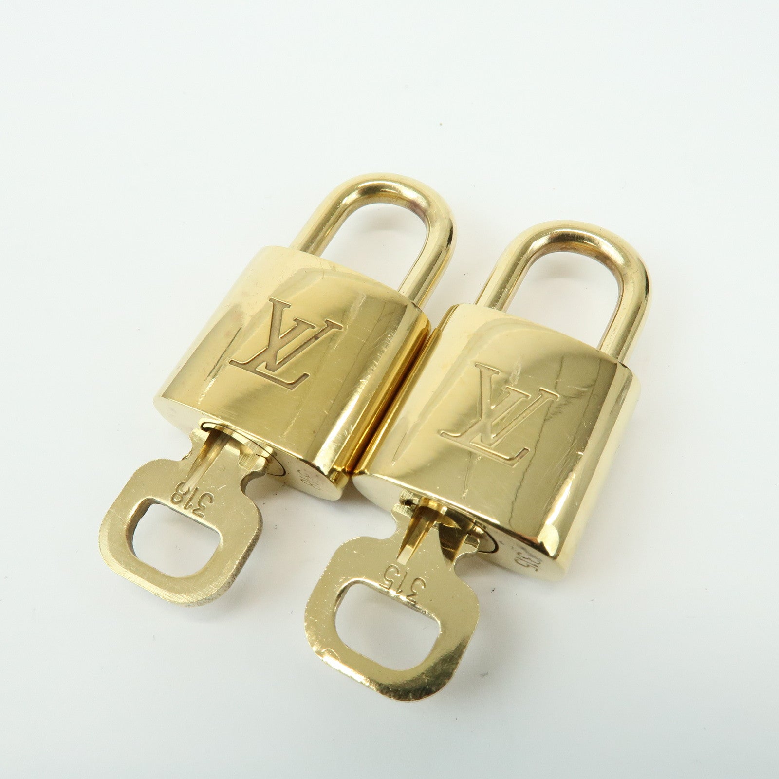 Louis Vuitton Set of 10 Lock & Key Cadena Key Lock