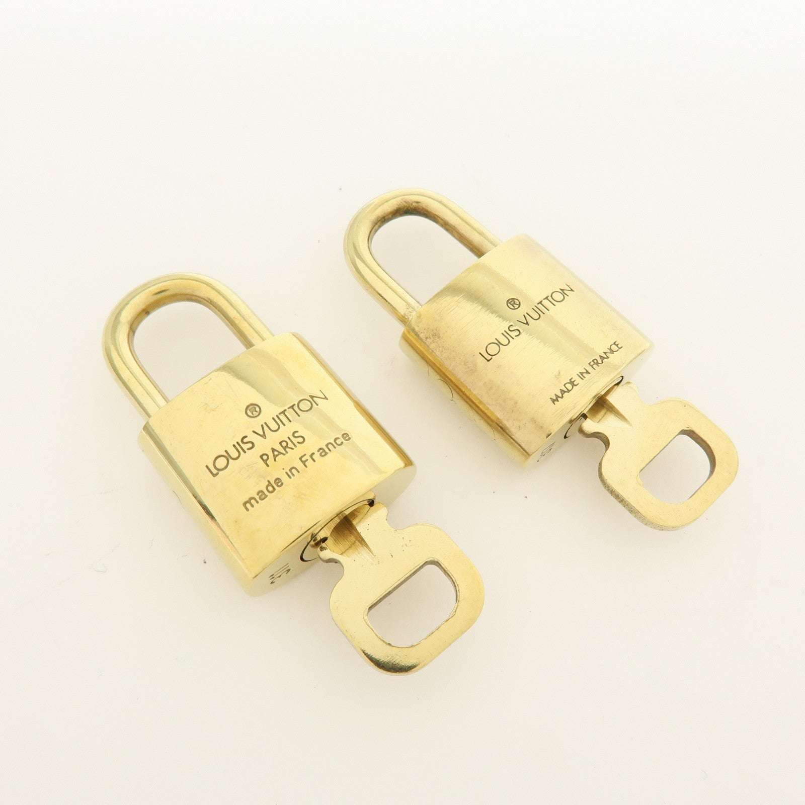 Louis Vuitton Lot of 10 Metal Lock & Key Cadena Key Lock Gold