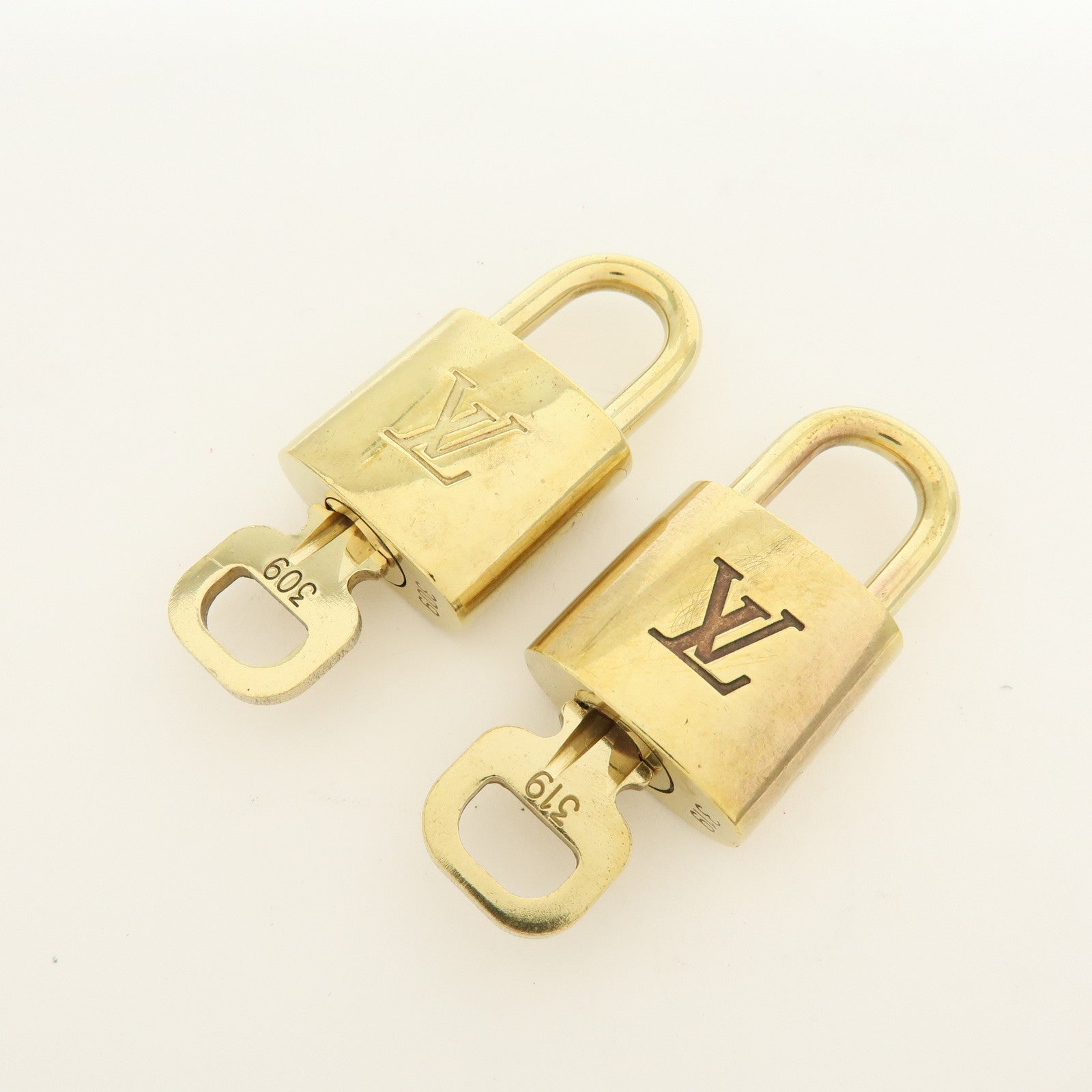 Louis Vuitton Lot of 10 Metal Lock & Key Cadena Key Lock Gold