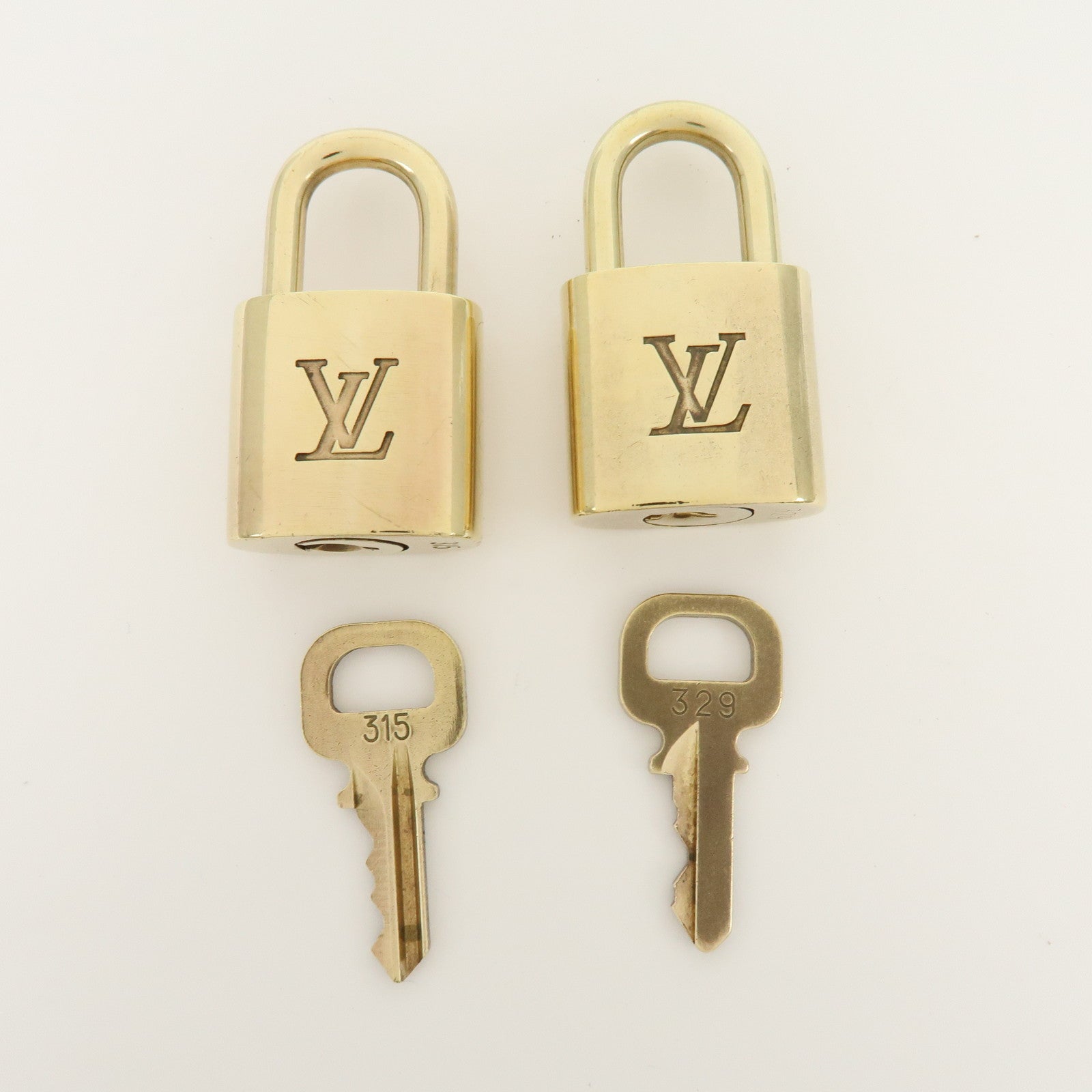 Louis Vuitton Set of 10 Metal Lock & Key Cadena Key Lock Gold