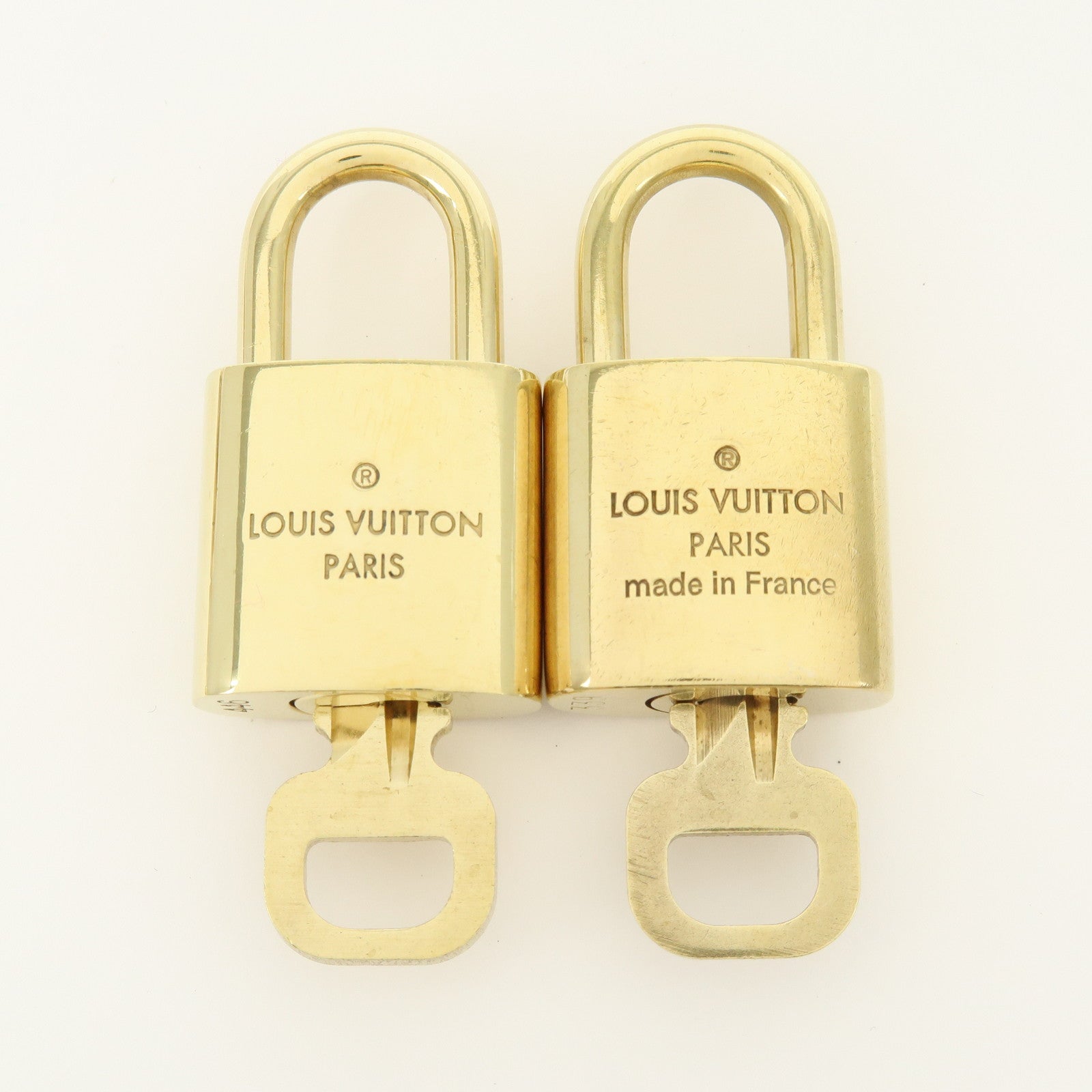 Louis Vuitton Lot of 10 Lock & Key Cadena Key Lock Gold