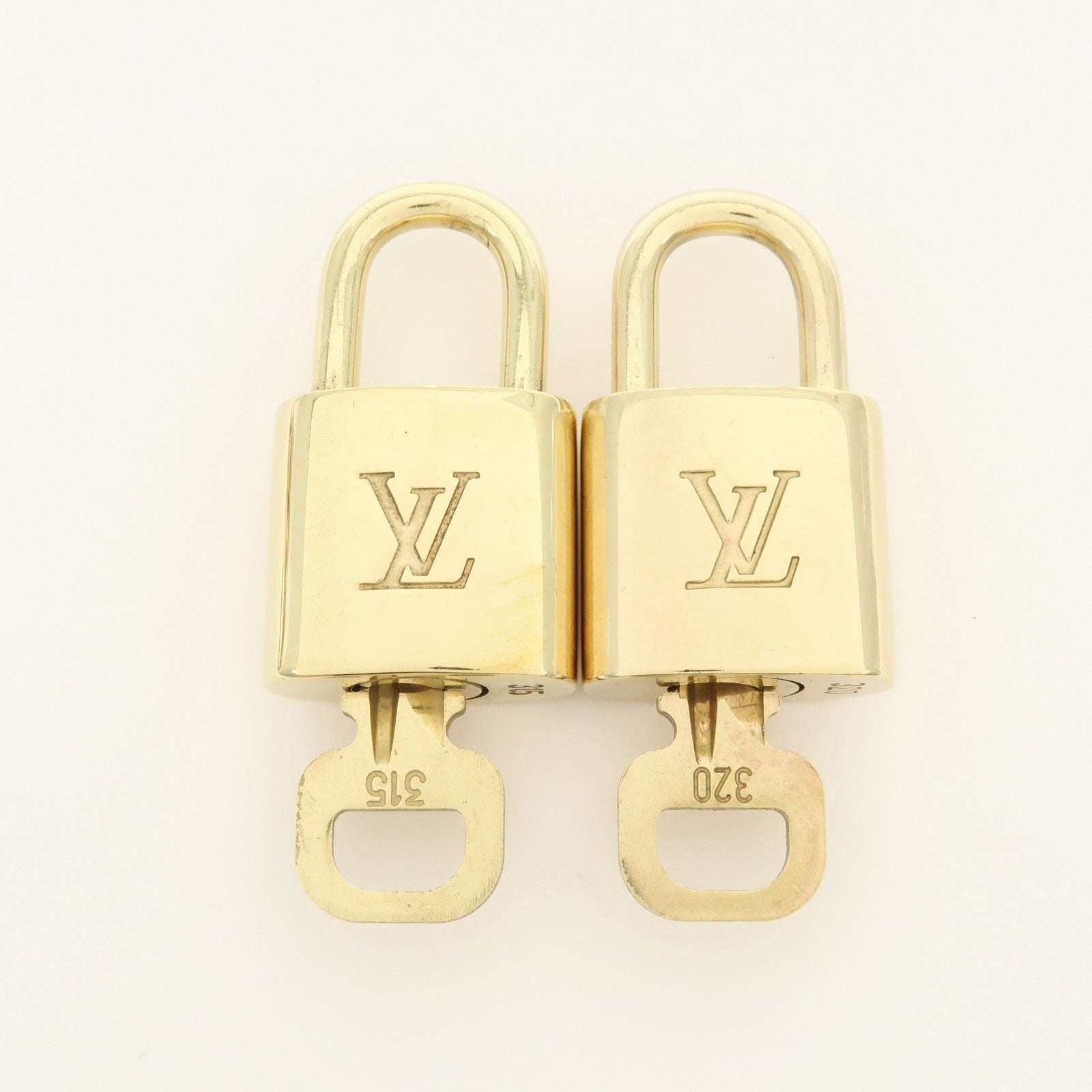 Louis Vuitton Lot of 10 Lock & Key Cadena Key Lock Gold