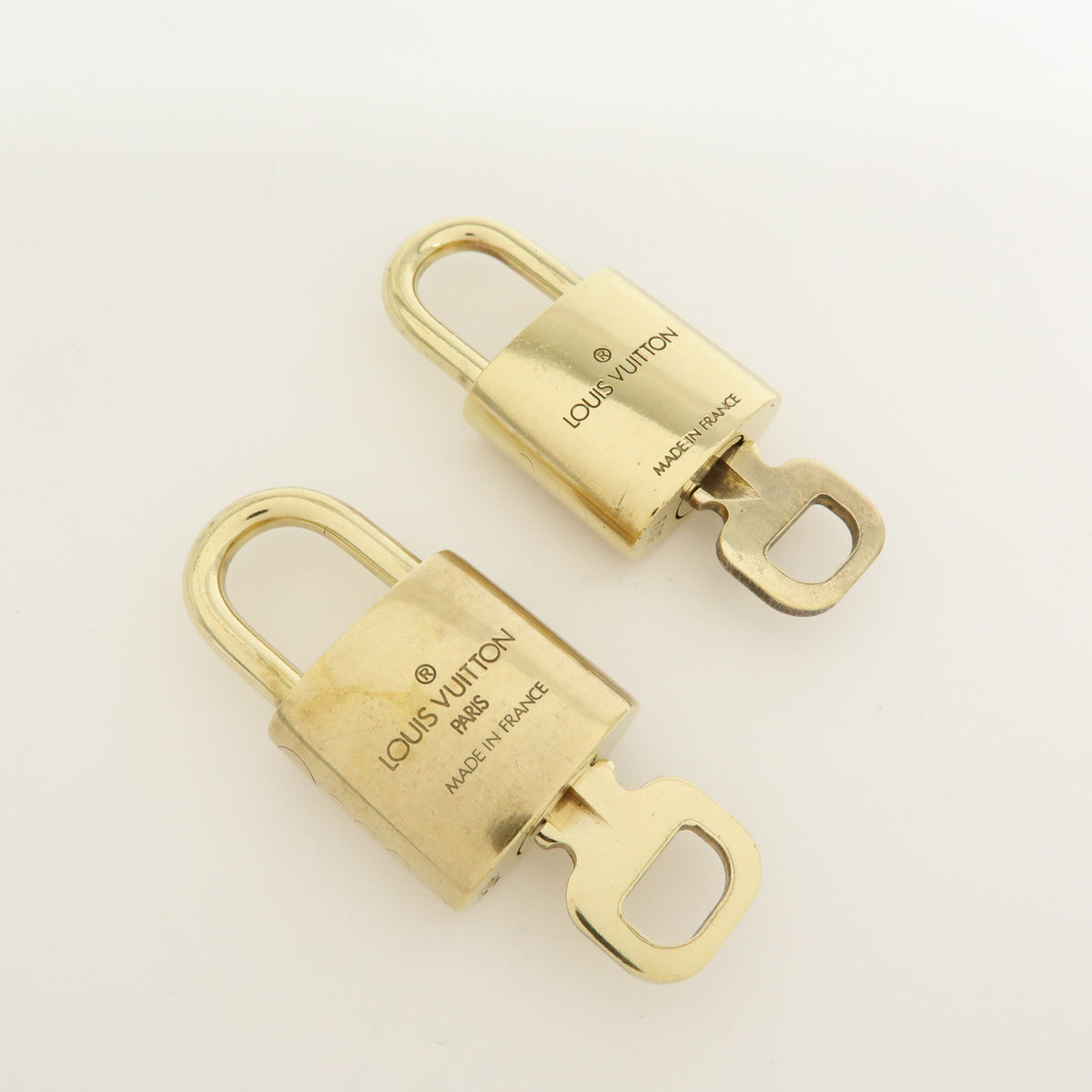 Louis Vuitton Lot of 10 Lock & Key Cadena Key Lock Gold