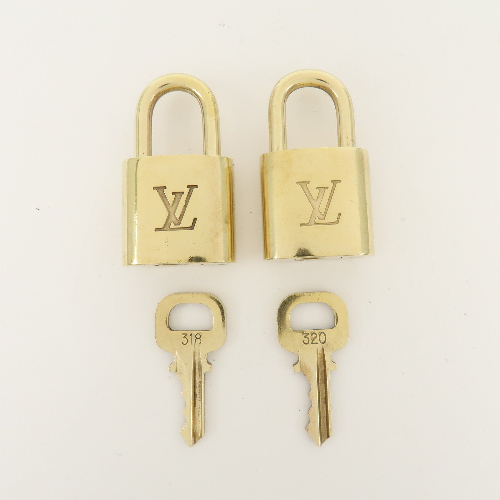 Louis Vuitton Set of 10 Metal Lock & Key Cadena Key Lock Gold
