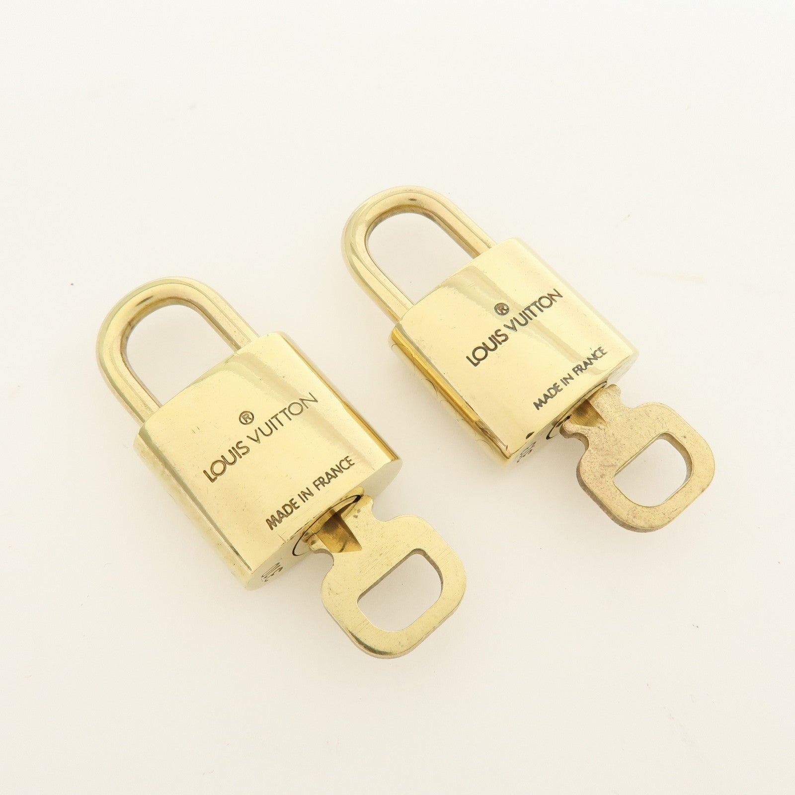 Louis Vuitton Lot of 10 Metal Lock & Key Cadena Key Lock Gold