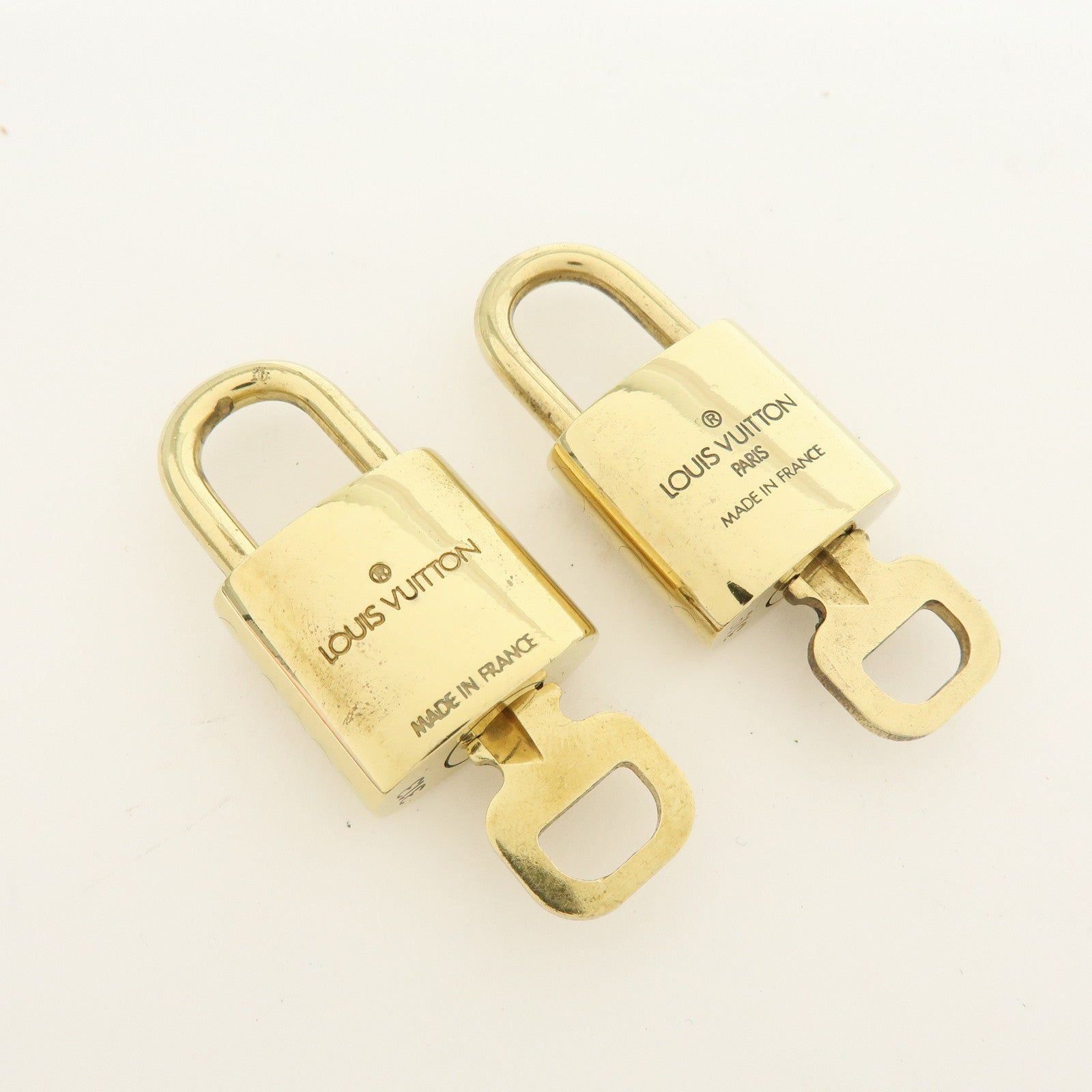 Louis Vuitton Lot of 10 Metal Lock & Key Cadena Key Lock Gold