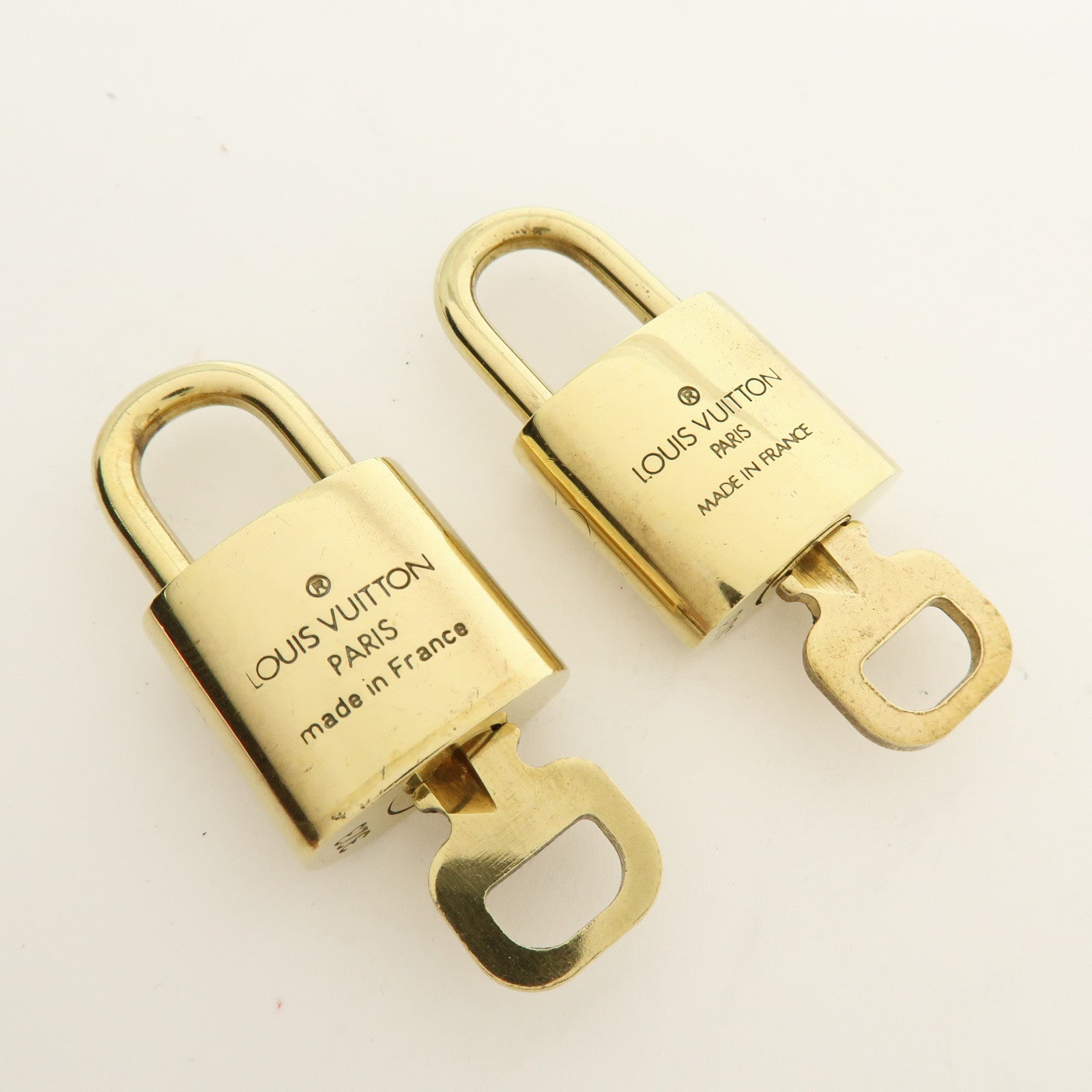 Louis Vuitton Lot of 10 Metal Lock & Key Cadena Key Lock Gold