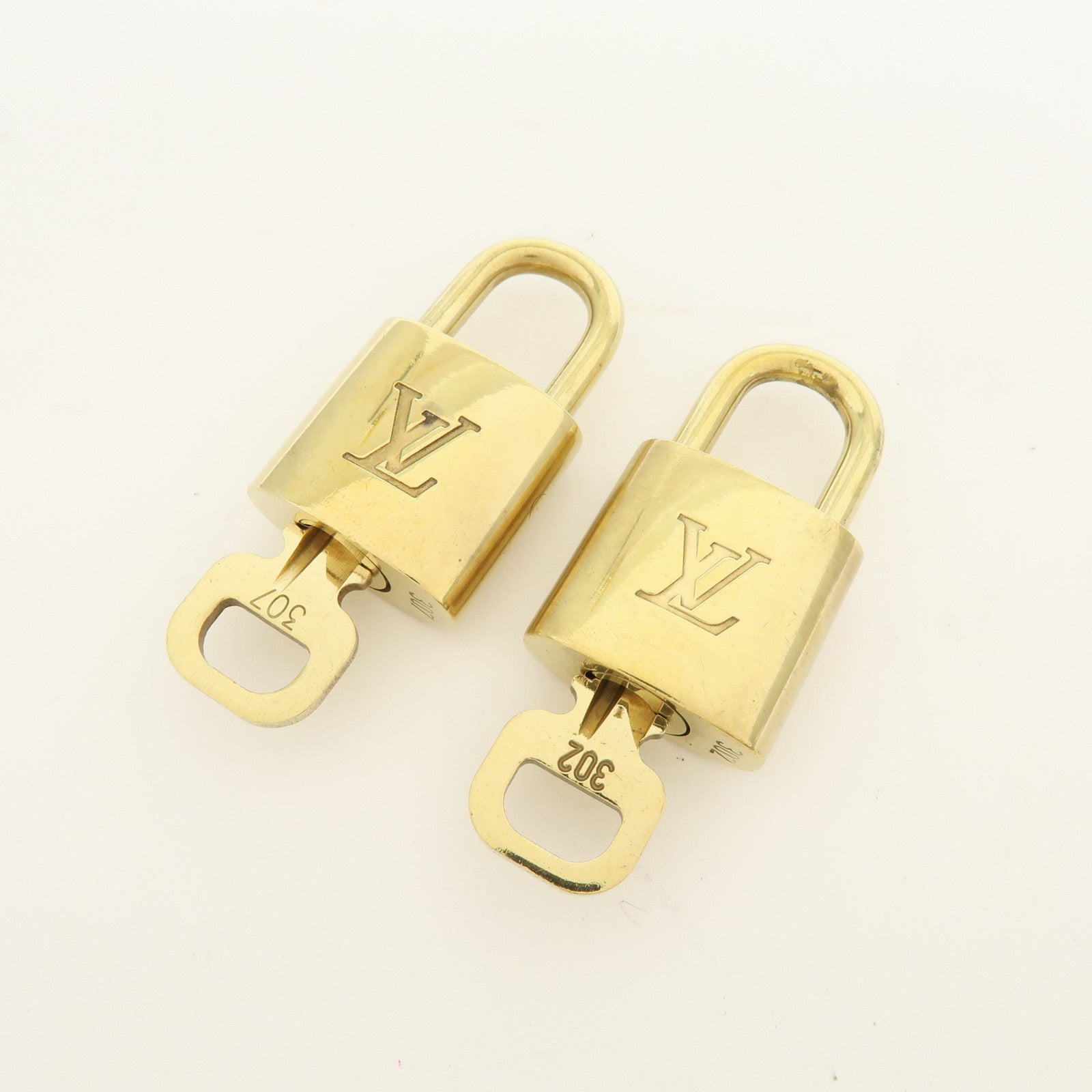 Louis Vuitton Lot of 10 Metal Lock & Key Cadena Key Lock Gold