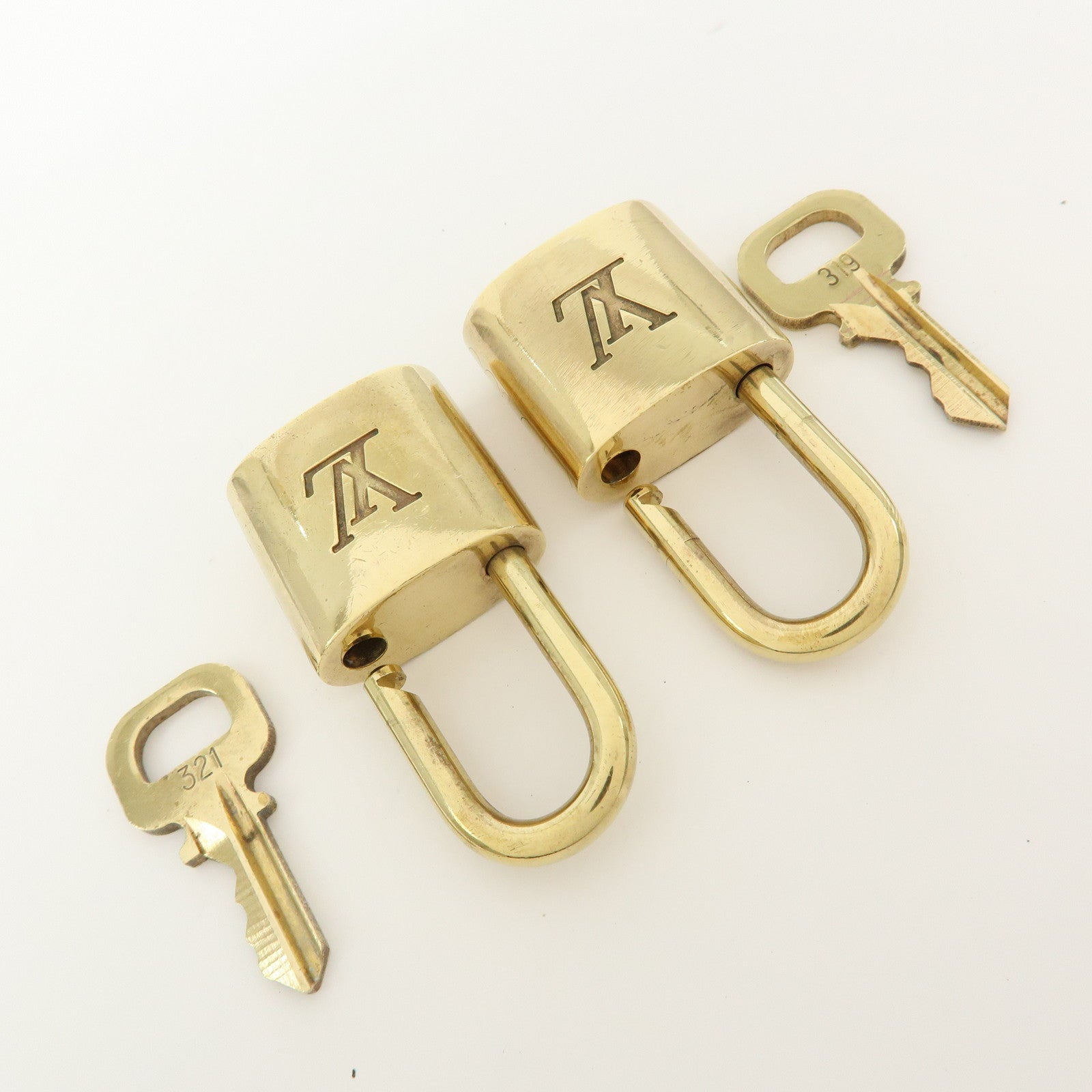 Louis Vuitton Set of 10 Lock & Key Cadena Key Lock Gold